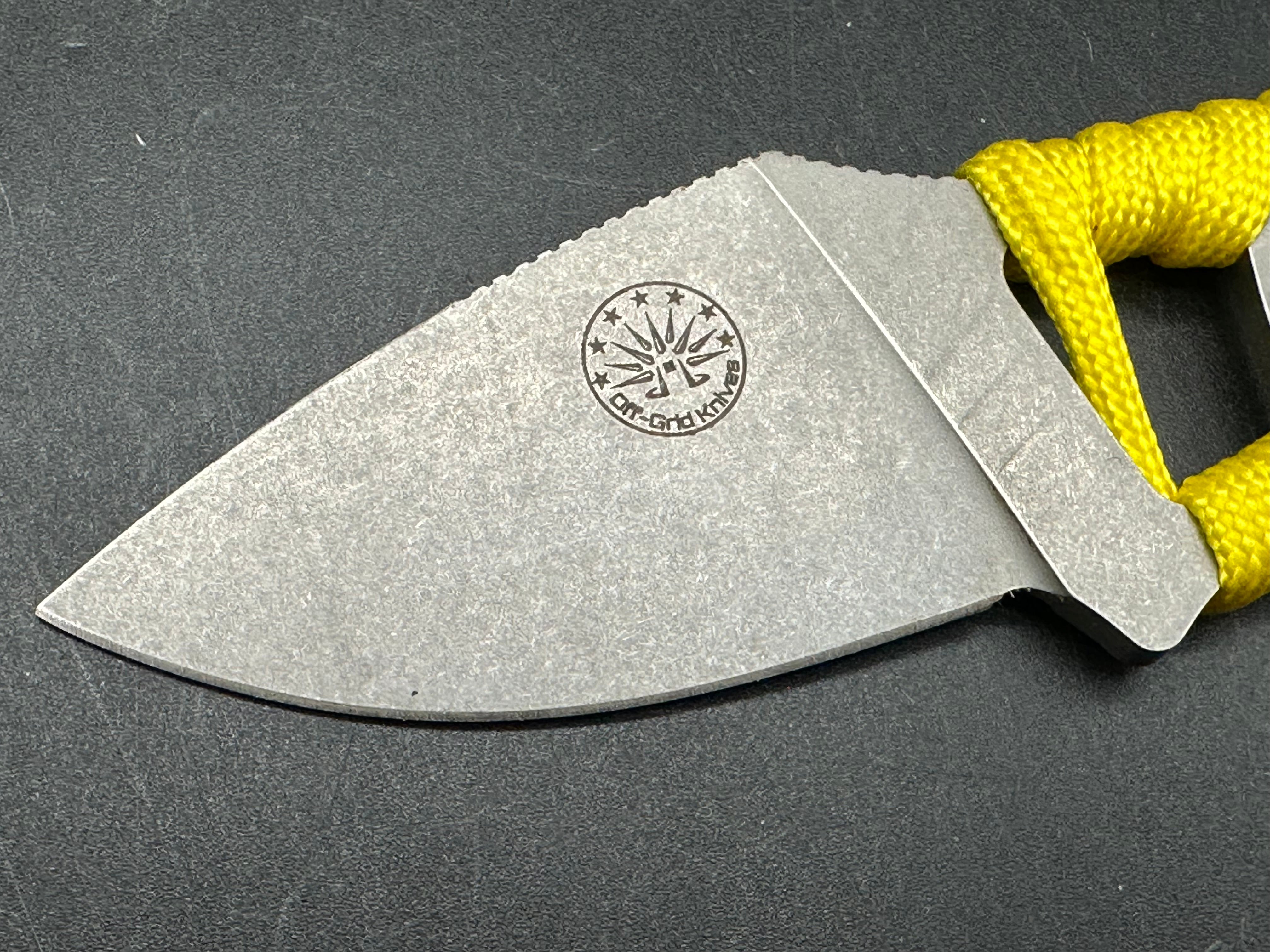 Charles Jones Blades Bonepicker in 3V steel with black micarta handles & Off Grid Knives All Day Fixie Neck knife in D2