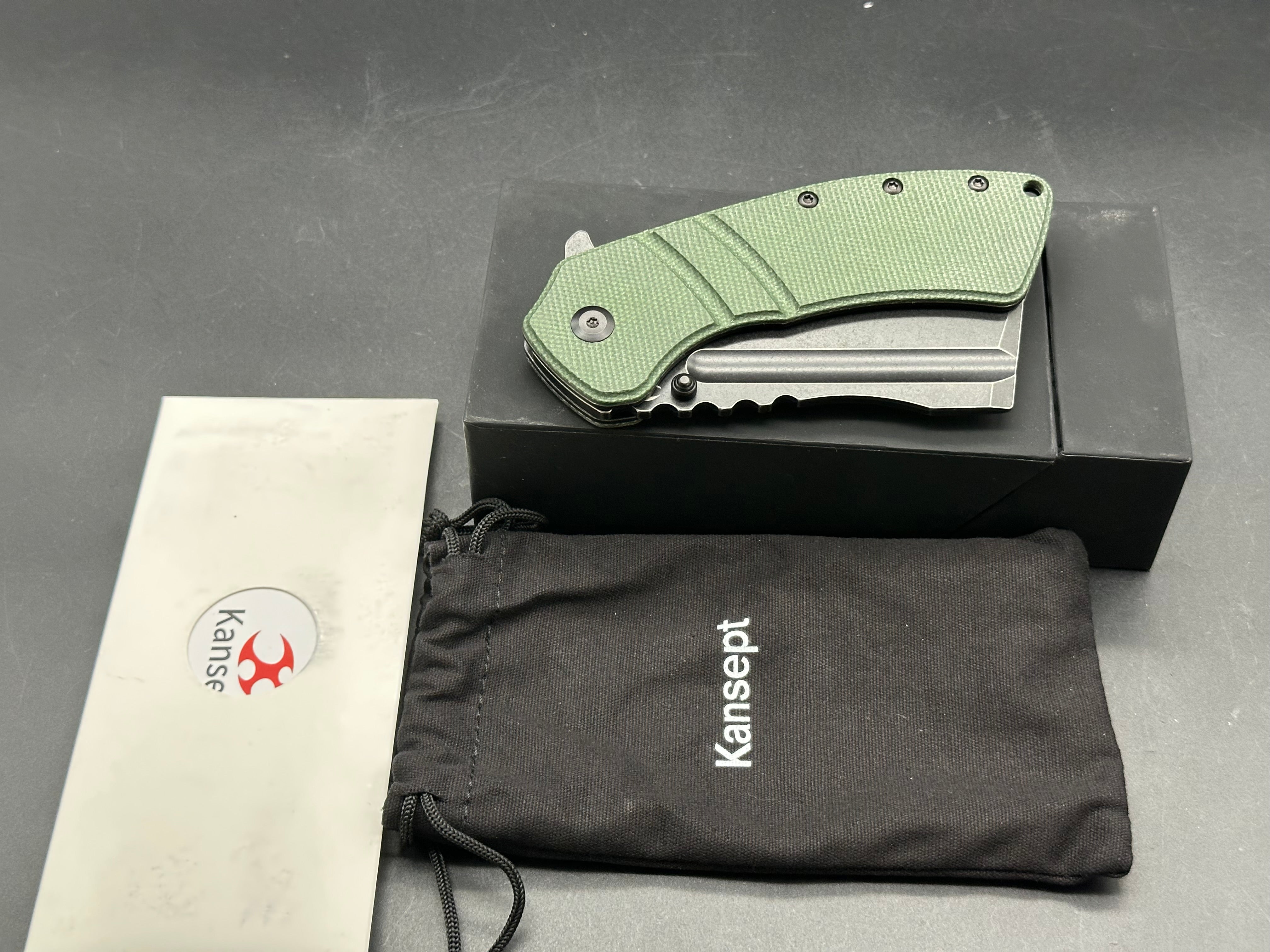 Kansept Korvid XL Green Micarta scales w/154CM blade