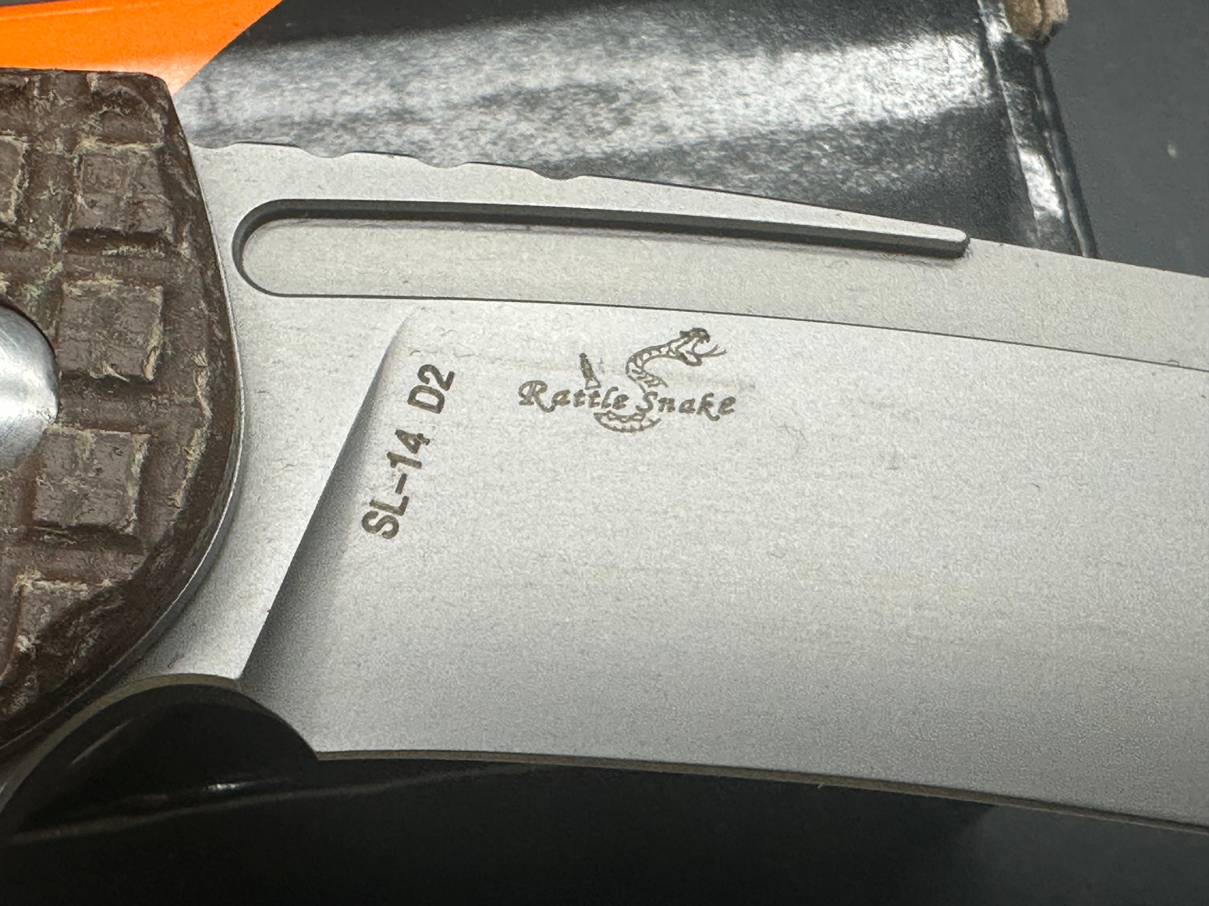 Sixleaf SL-14 liner lock, frag micarta scales, D2 blade