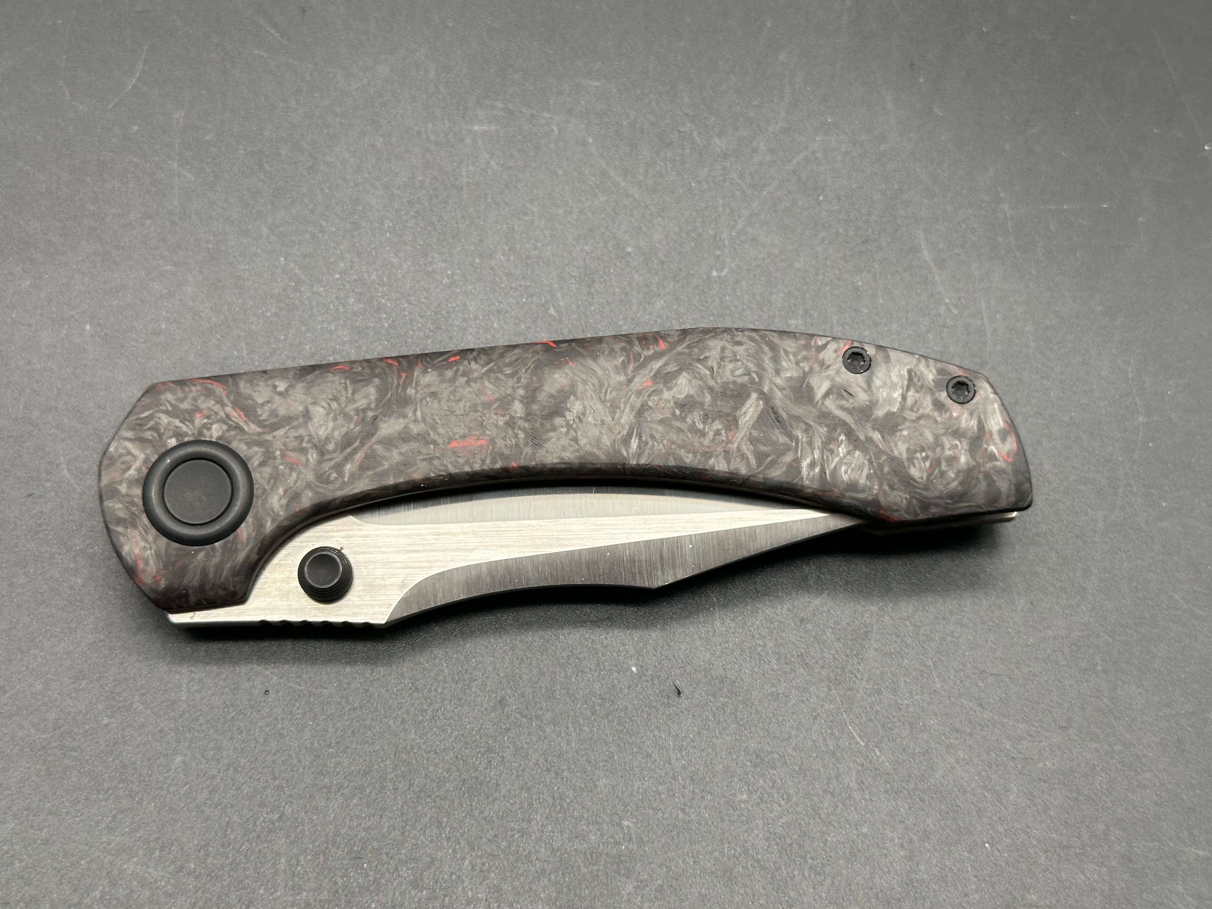 Brian Brown Raptor V2 (Reate) with black marble Carbon Fiber show scale