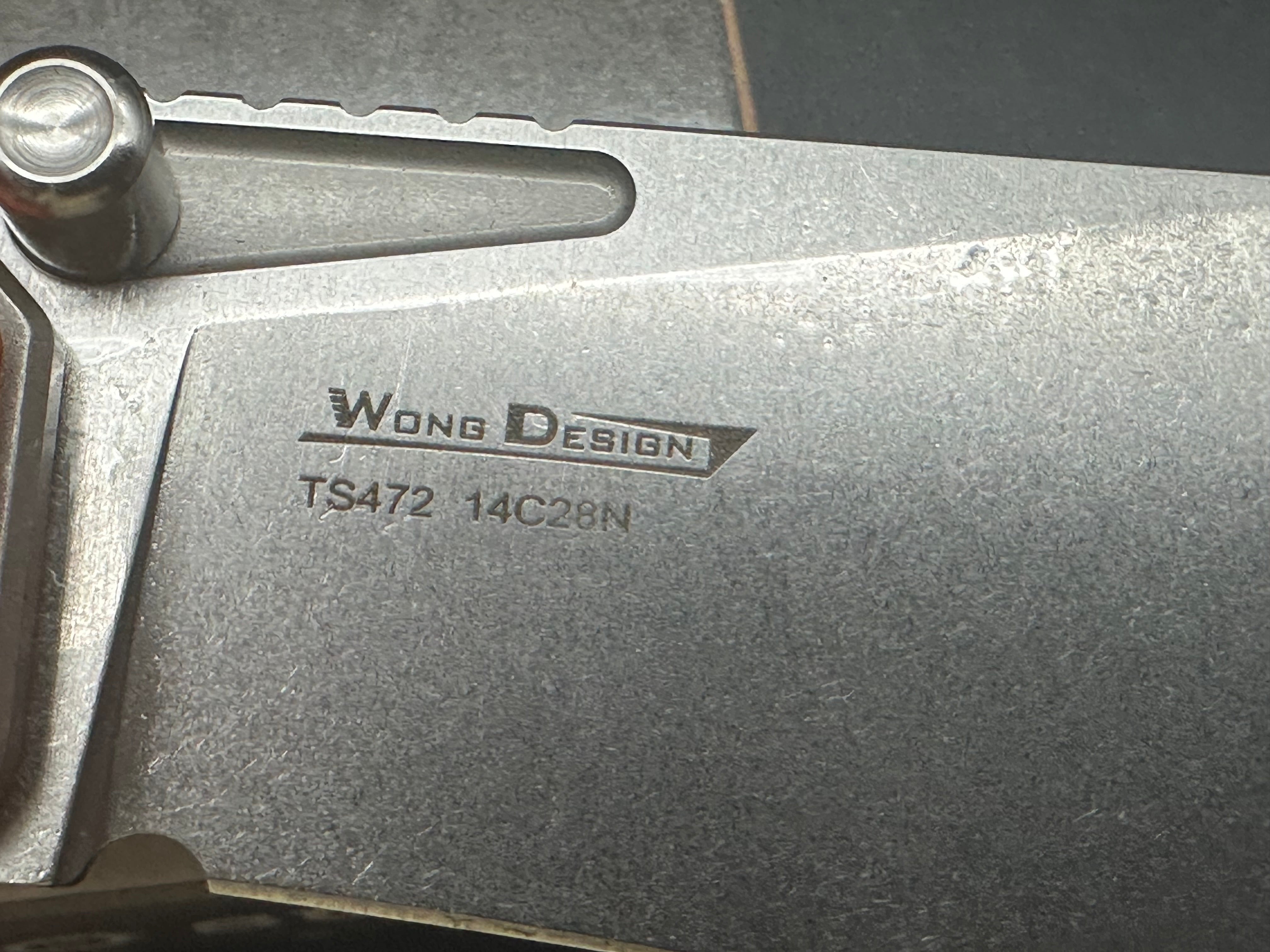 TwoSun TS472 Wong design, liner lock, titanium and orange G10 scales, 14c28n blade