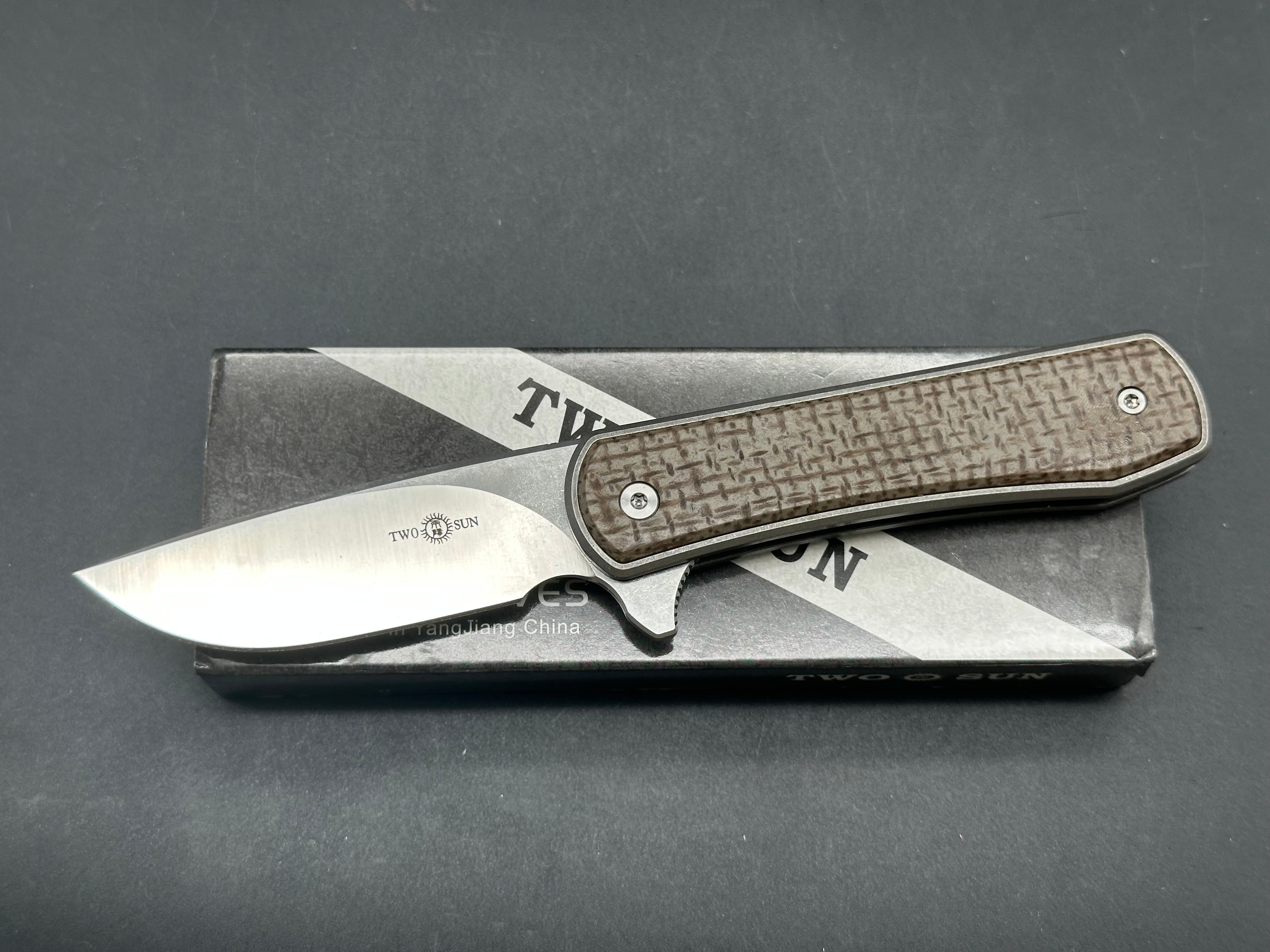 TwoSun TS335 YX design, double detent slip joint, titanium and micarta scales, 14c28n blade