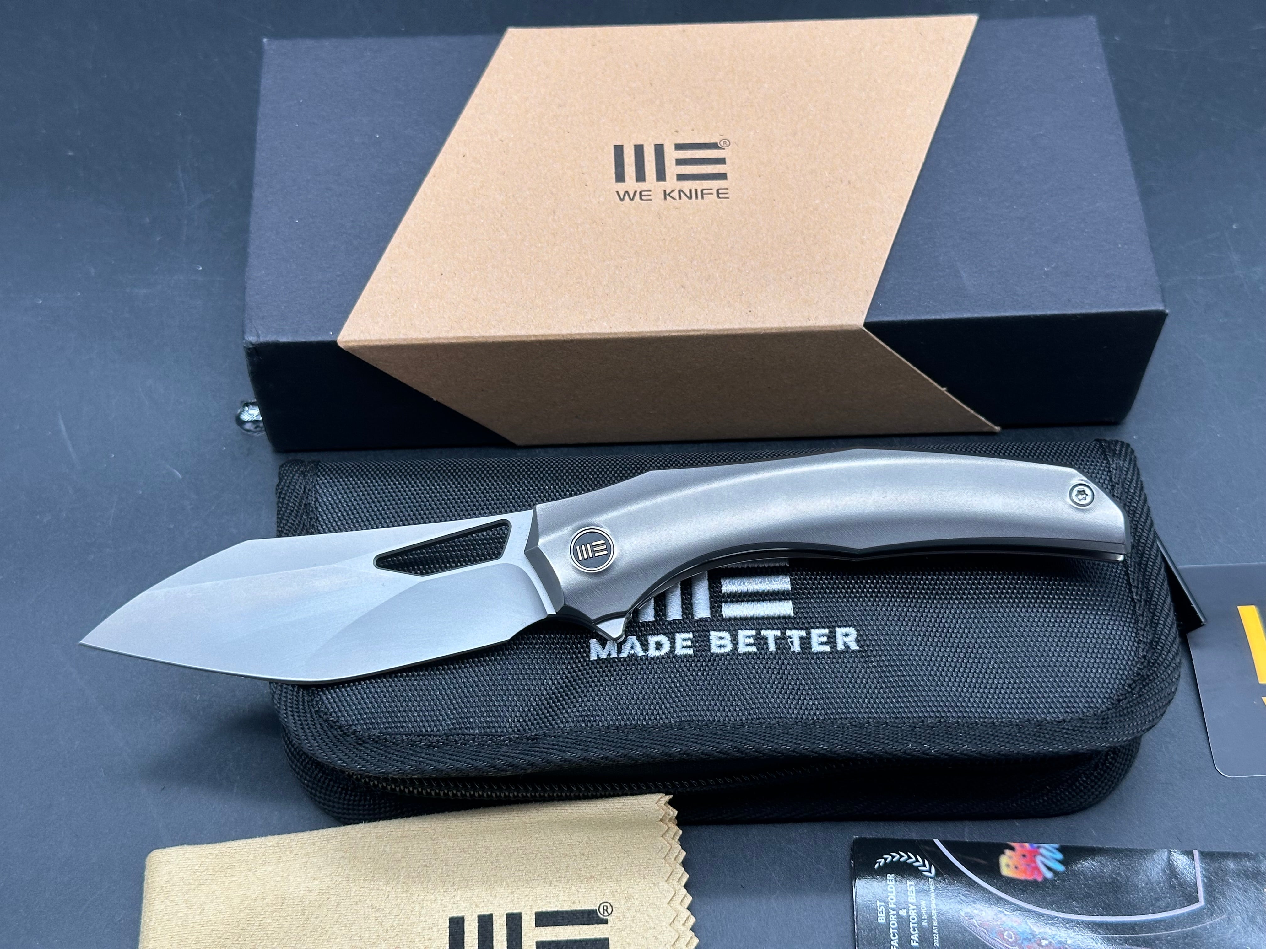 WE Knife Co. Ignio Polished Titanium 20CV blade Anodized clip