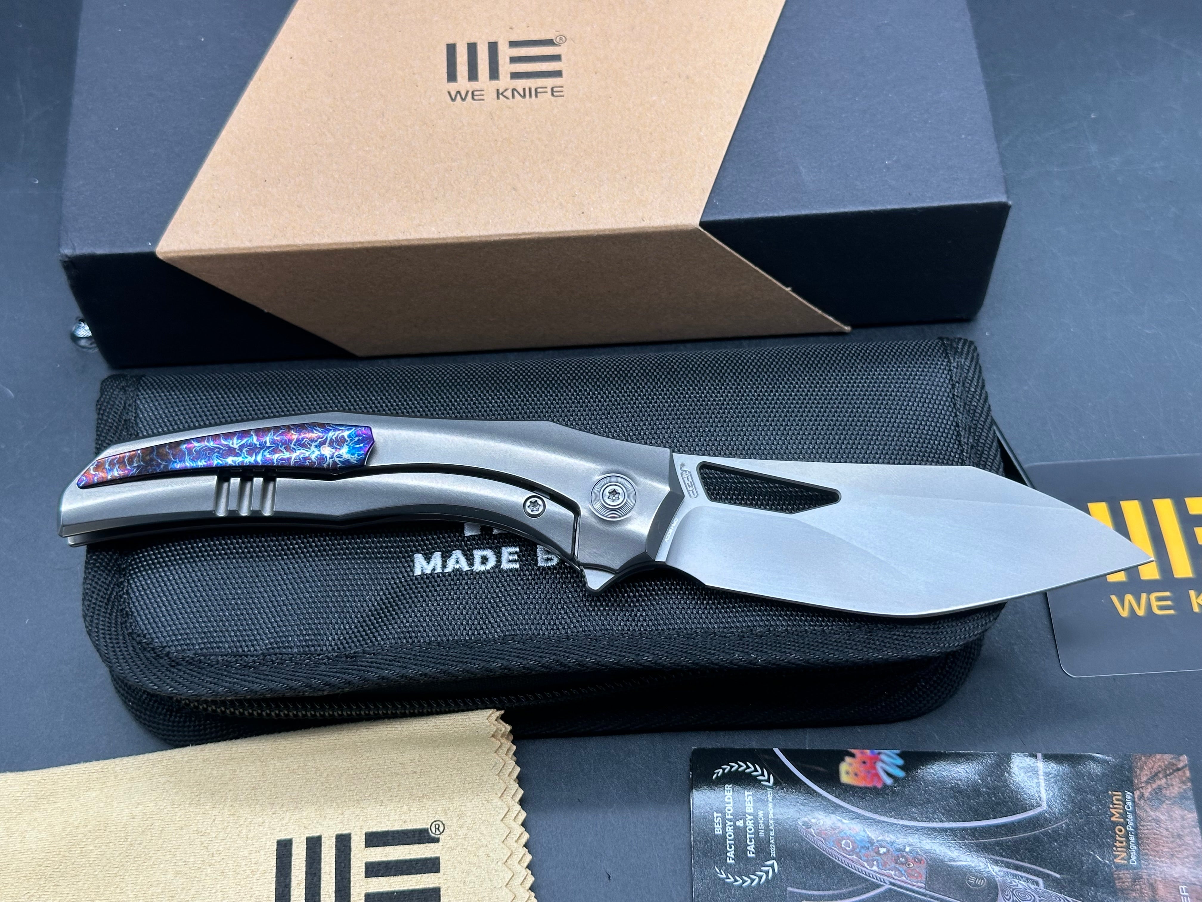 WE Knife Co. Ignio Polished Titanium 20CV blade Anodized clip