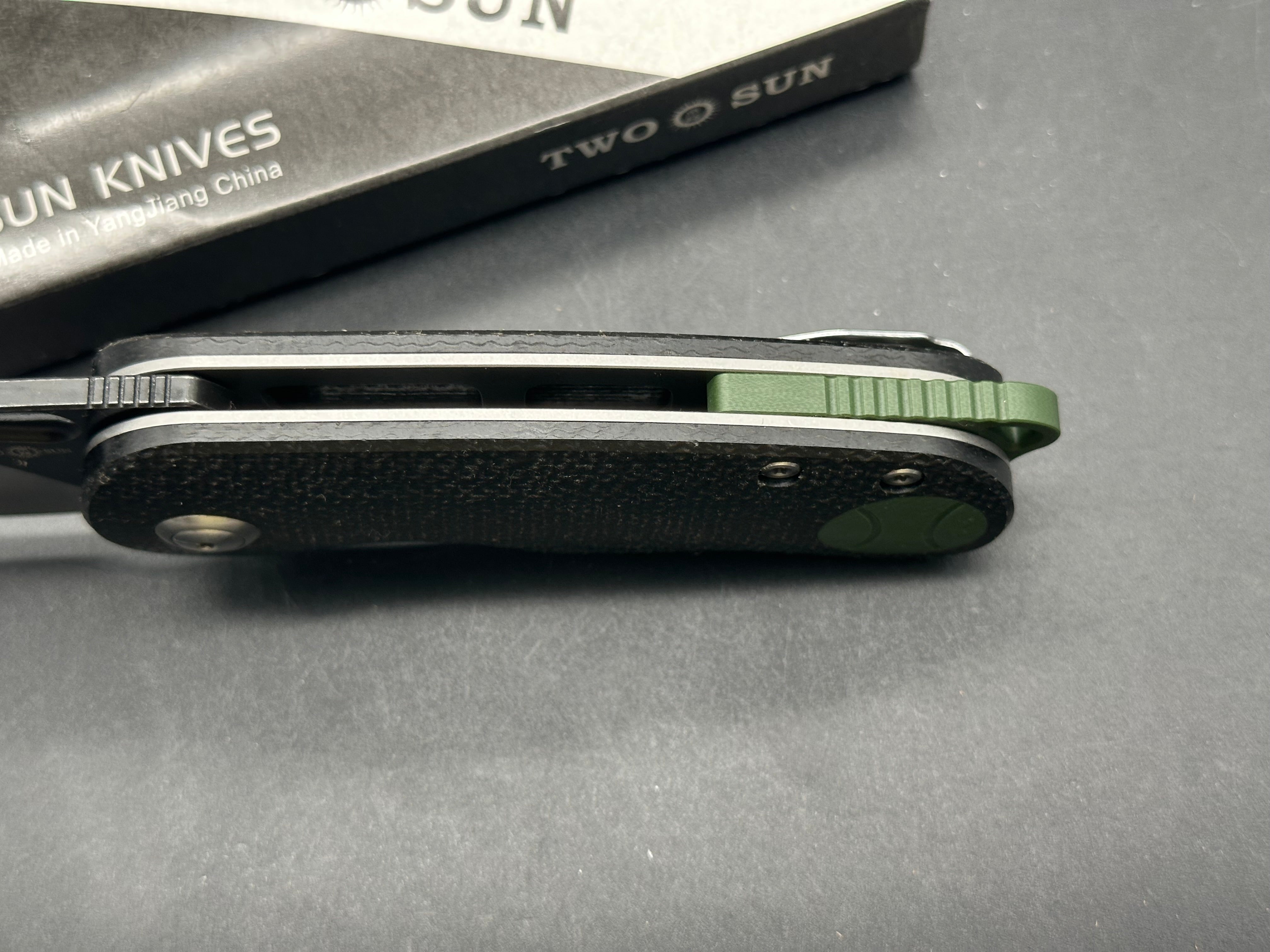 TwoSun TS506 David Chen design, liner lock, black micarta with green G10 inserts and back spacer, N690 blade
