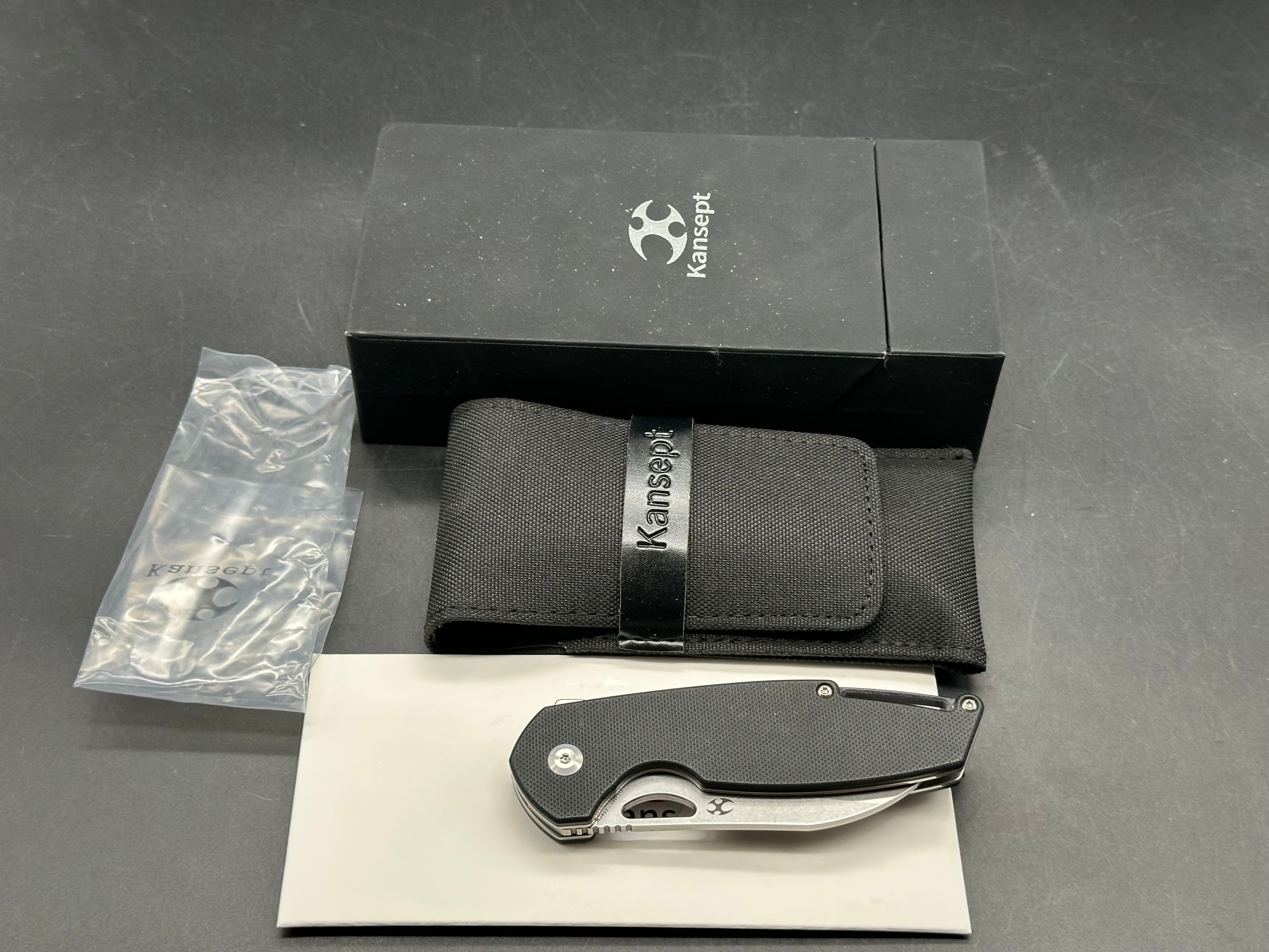 Kansept MODEL 6 FOLDING KNIFE BLACK G10 HANDLE 154CM PLAIN EDGE