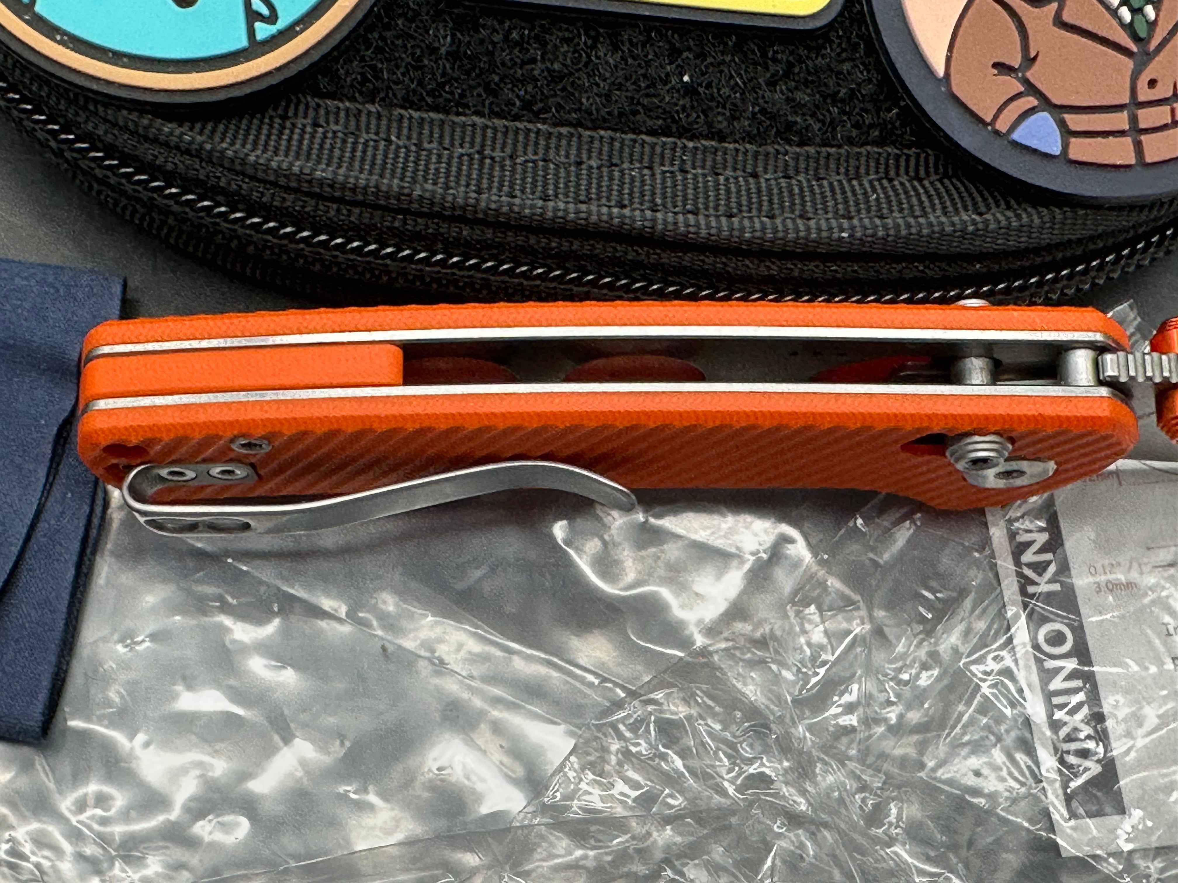 Vixino RockShark 3.03" 14C28N Stonewash Blade with Orange Angle Milled G10 Scales