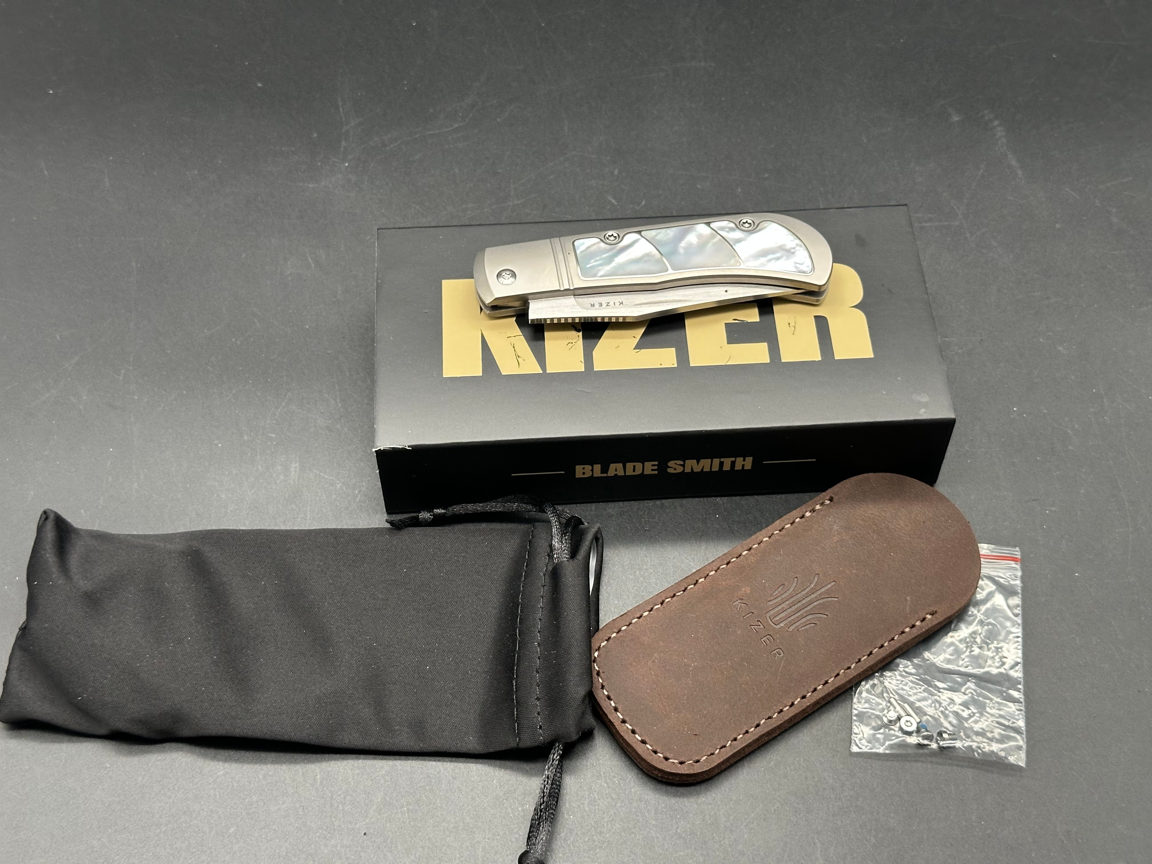 KIZER TRESTLE PEARL TITANIUM HANDLE S45VN CLIP POINT PLAIN EDGE