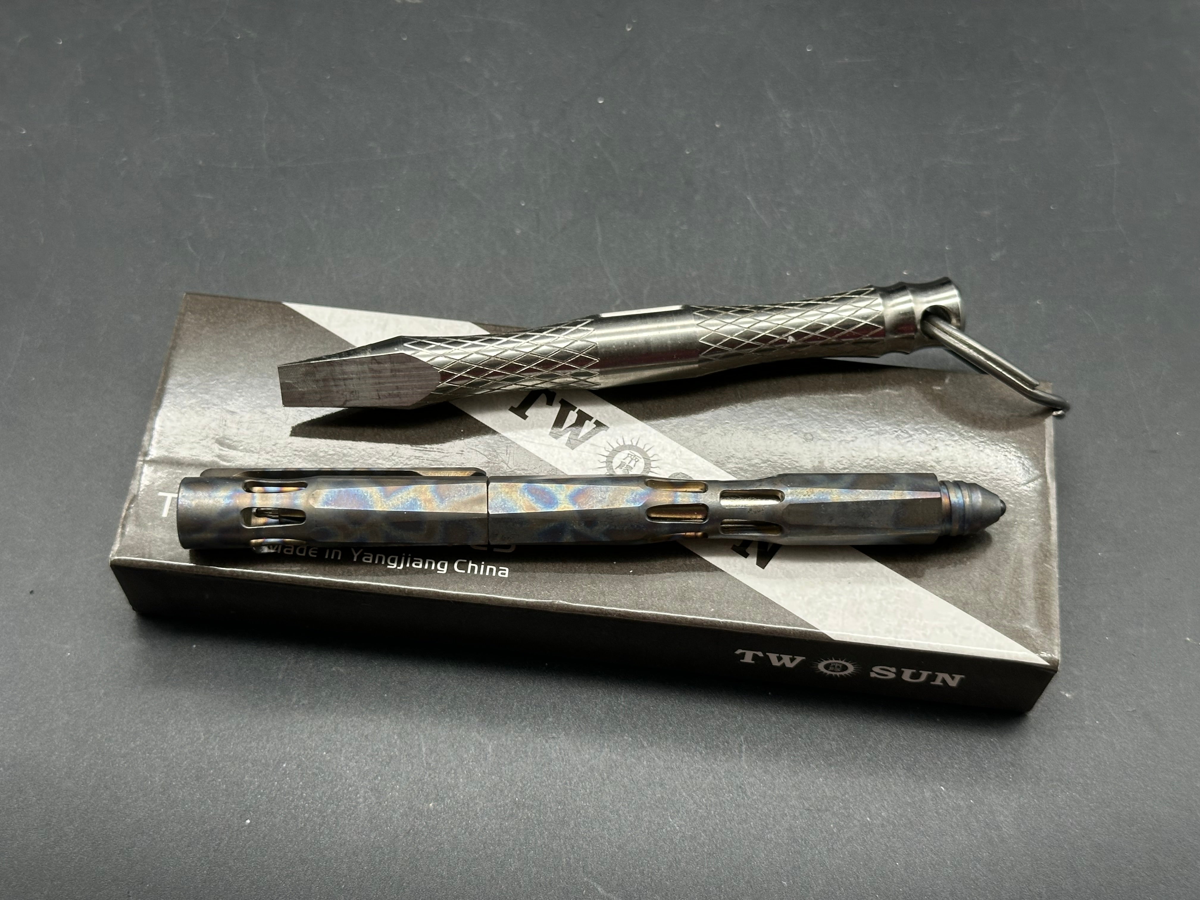 TwoSun tools a tactical pen and a prybar
