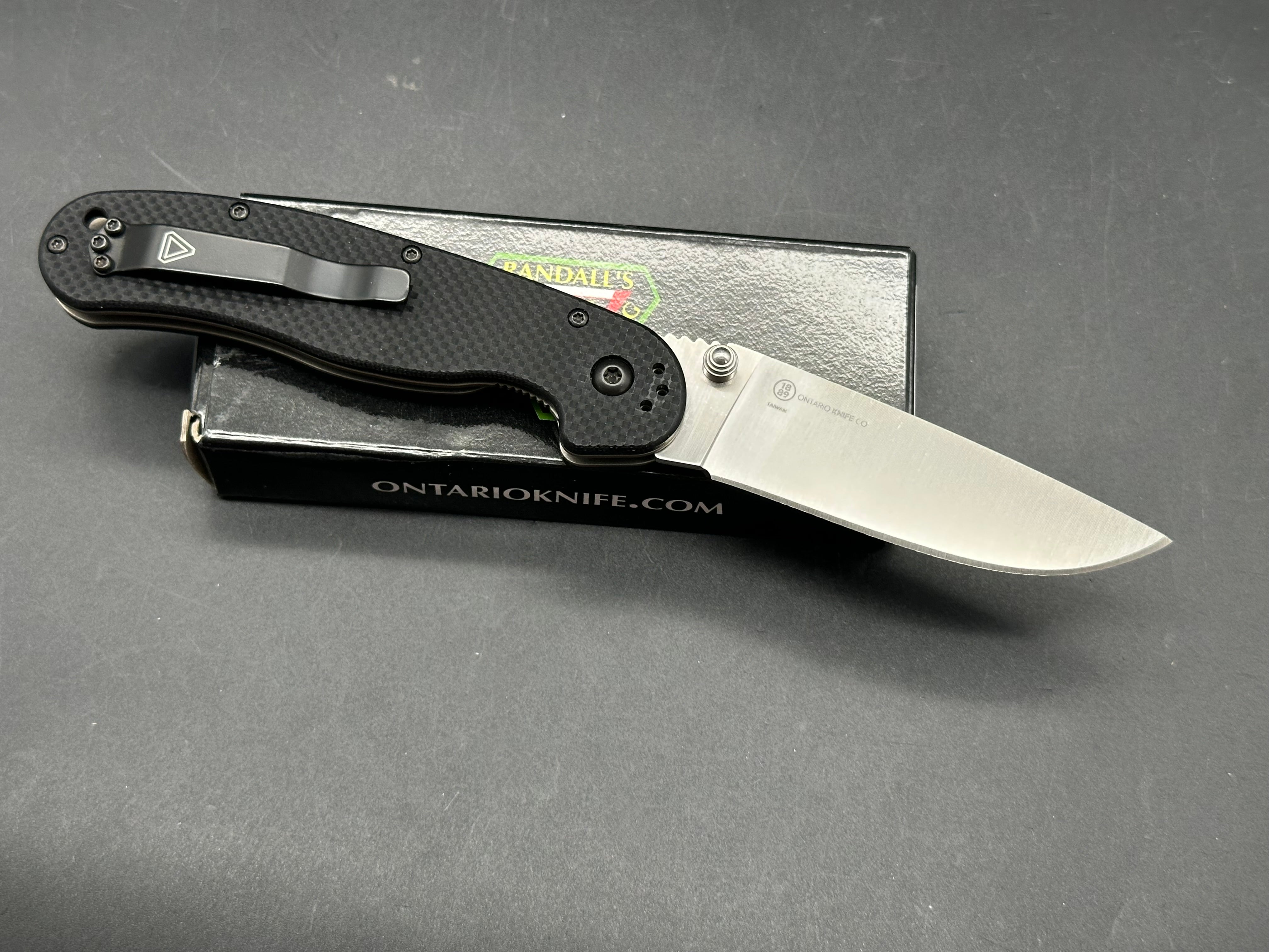 Ontario Rat Model 1.5 3.25" CPM MagnaCut with Black Textured G10 Scales