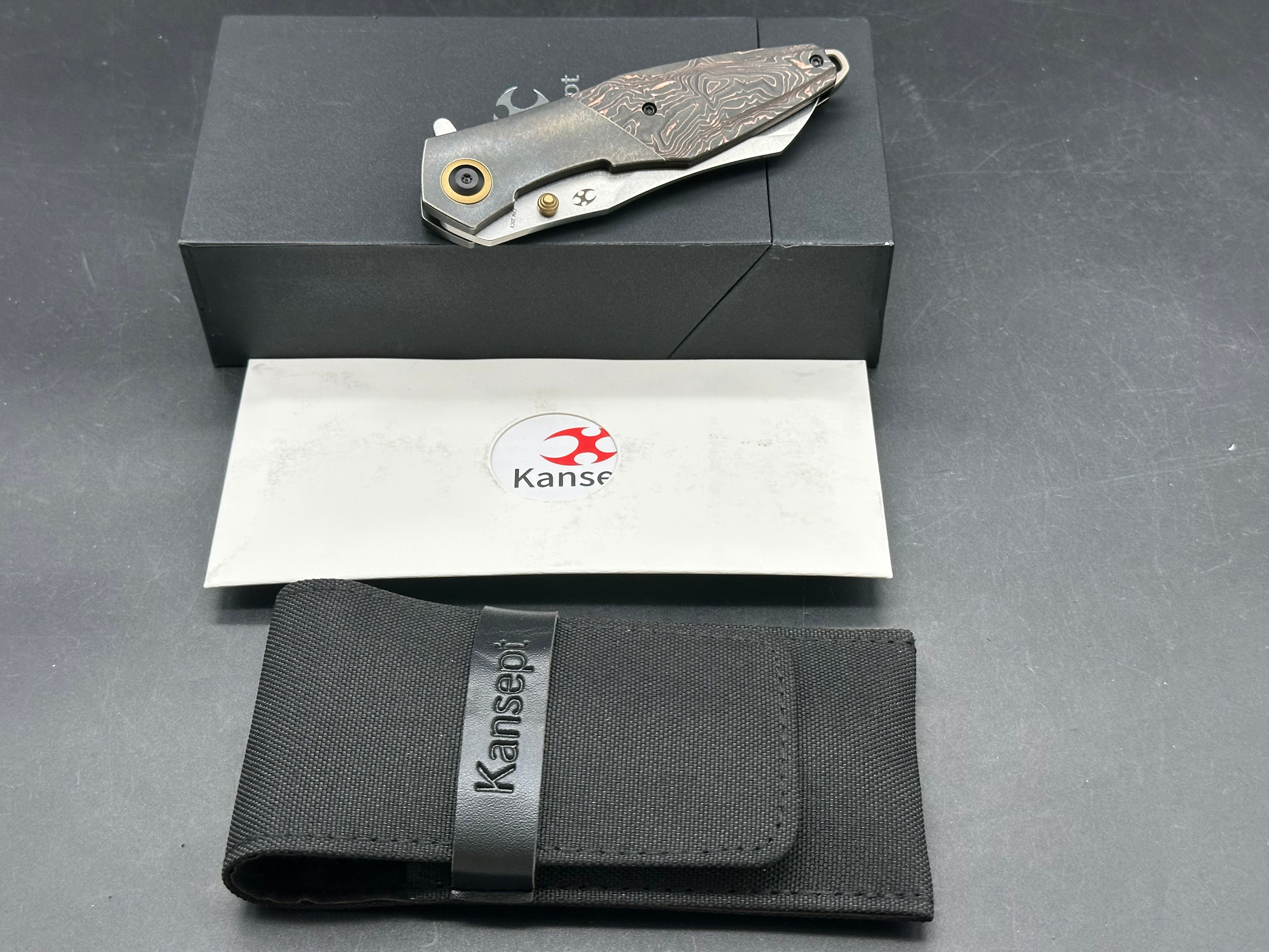 Kansept Knives Jonathan Styles Mistaken 3.15" CPM-20CV Modified Wharncliffe Blade, Black Titanium Handles with Copper Carbon Fiber Inlays