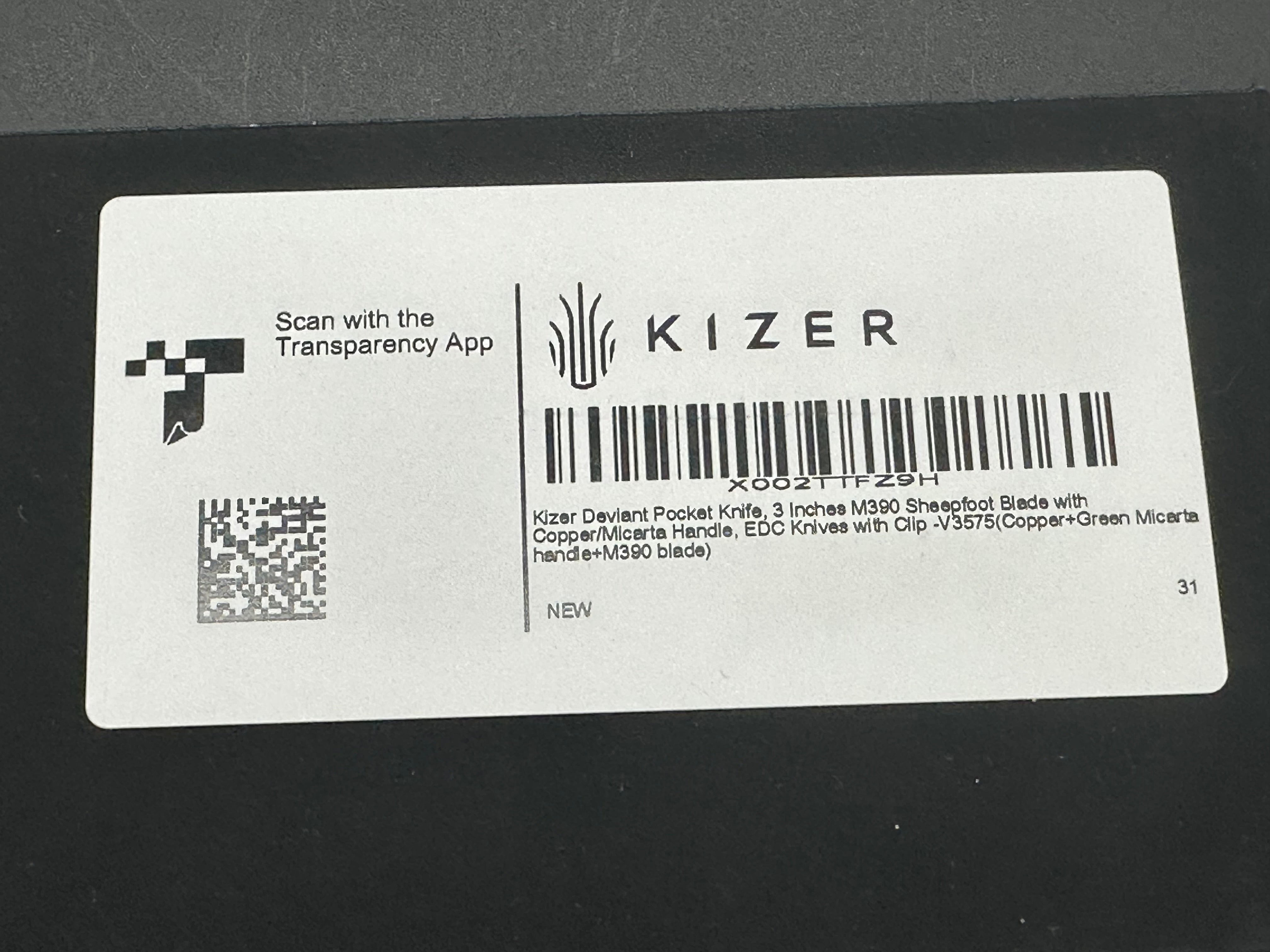 Kizer Deviant copper/micarta M390