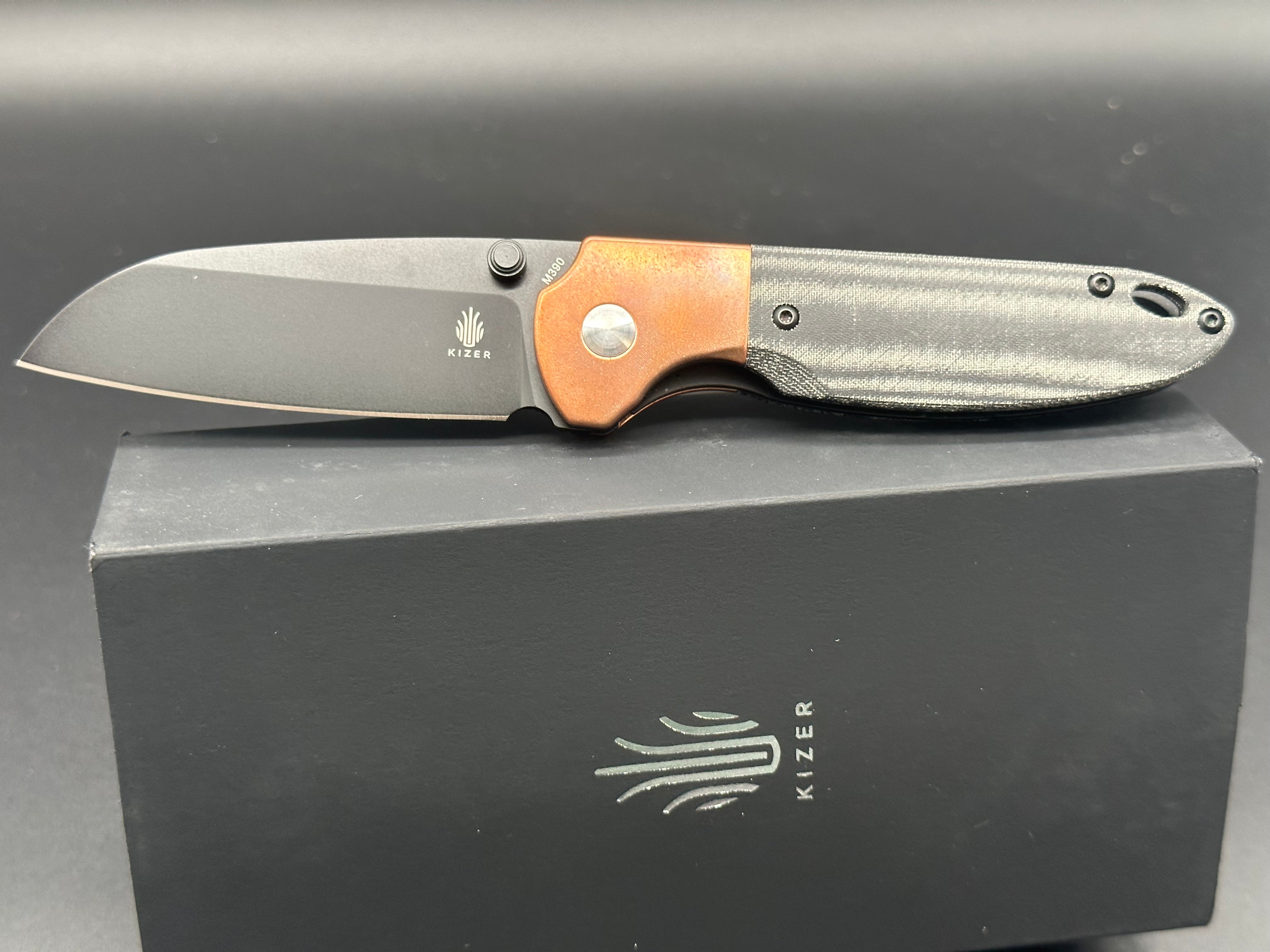 Kizer Deviant copper/micarta M390