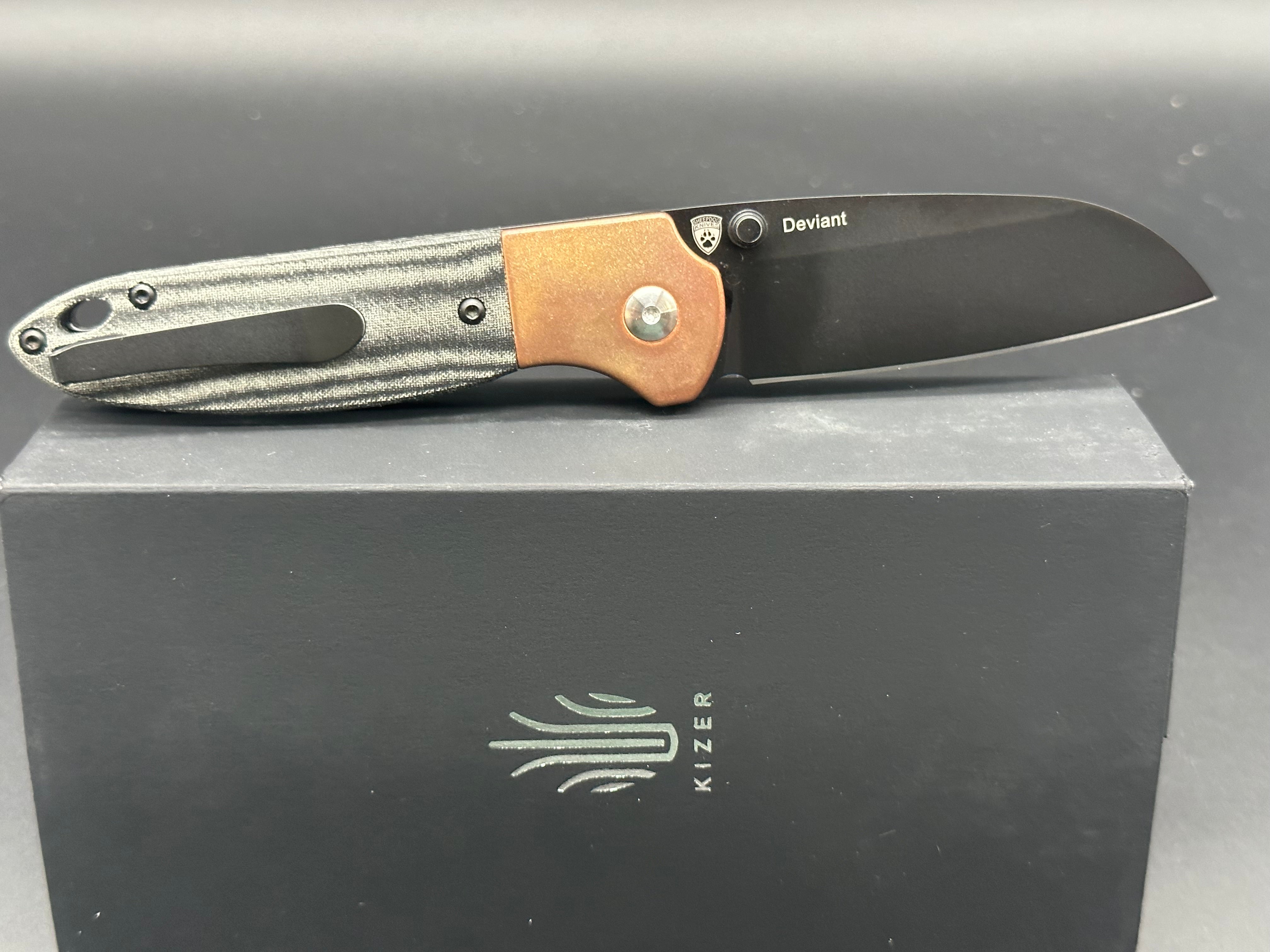 Kizer Deviant copper/micarta M390
