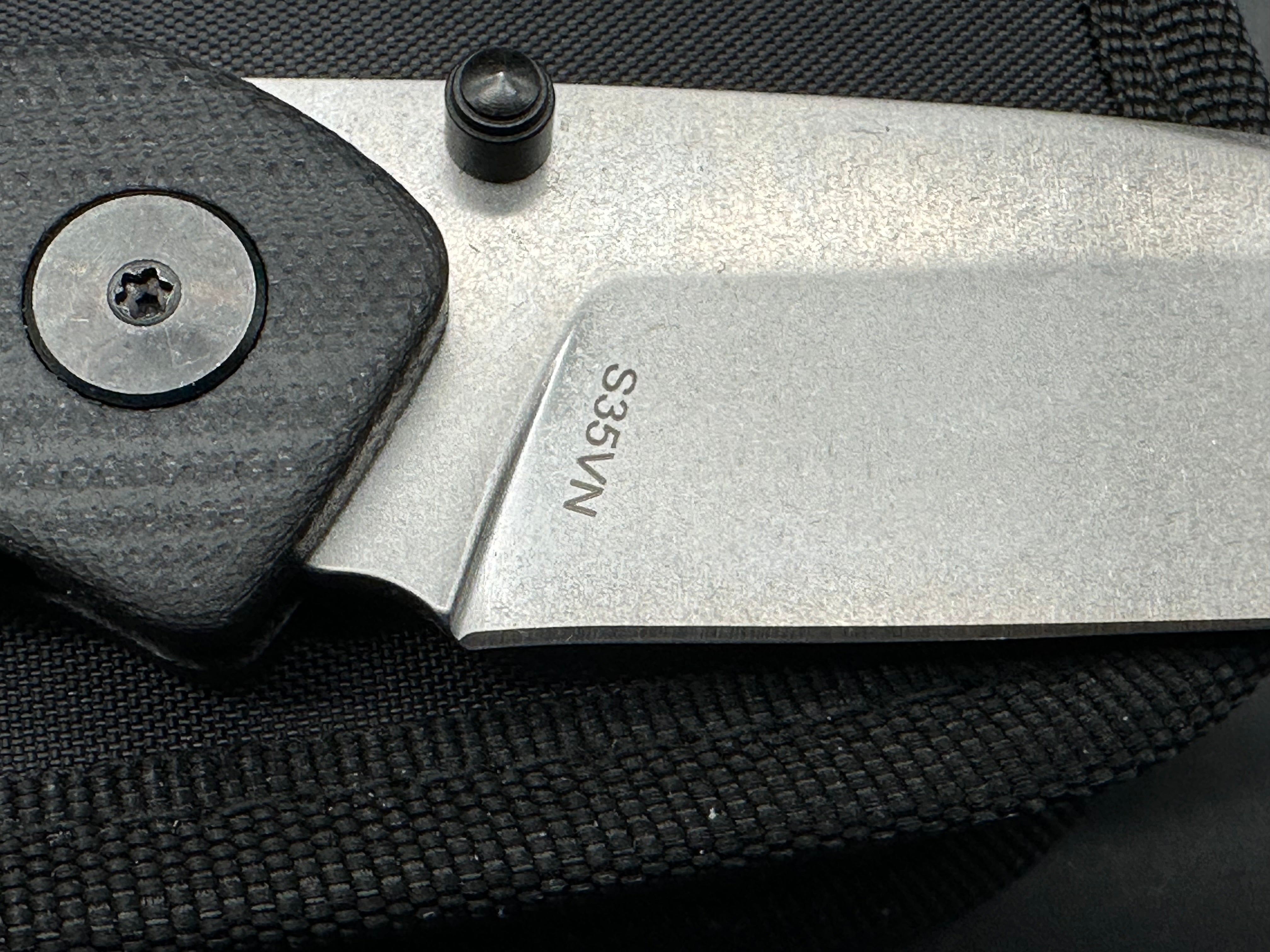 Asher Spiro TS (Thumb Studs), 3.2" S35VN Stonewash Blade with Black G10 Handle.