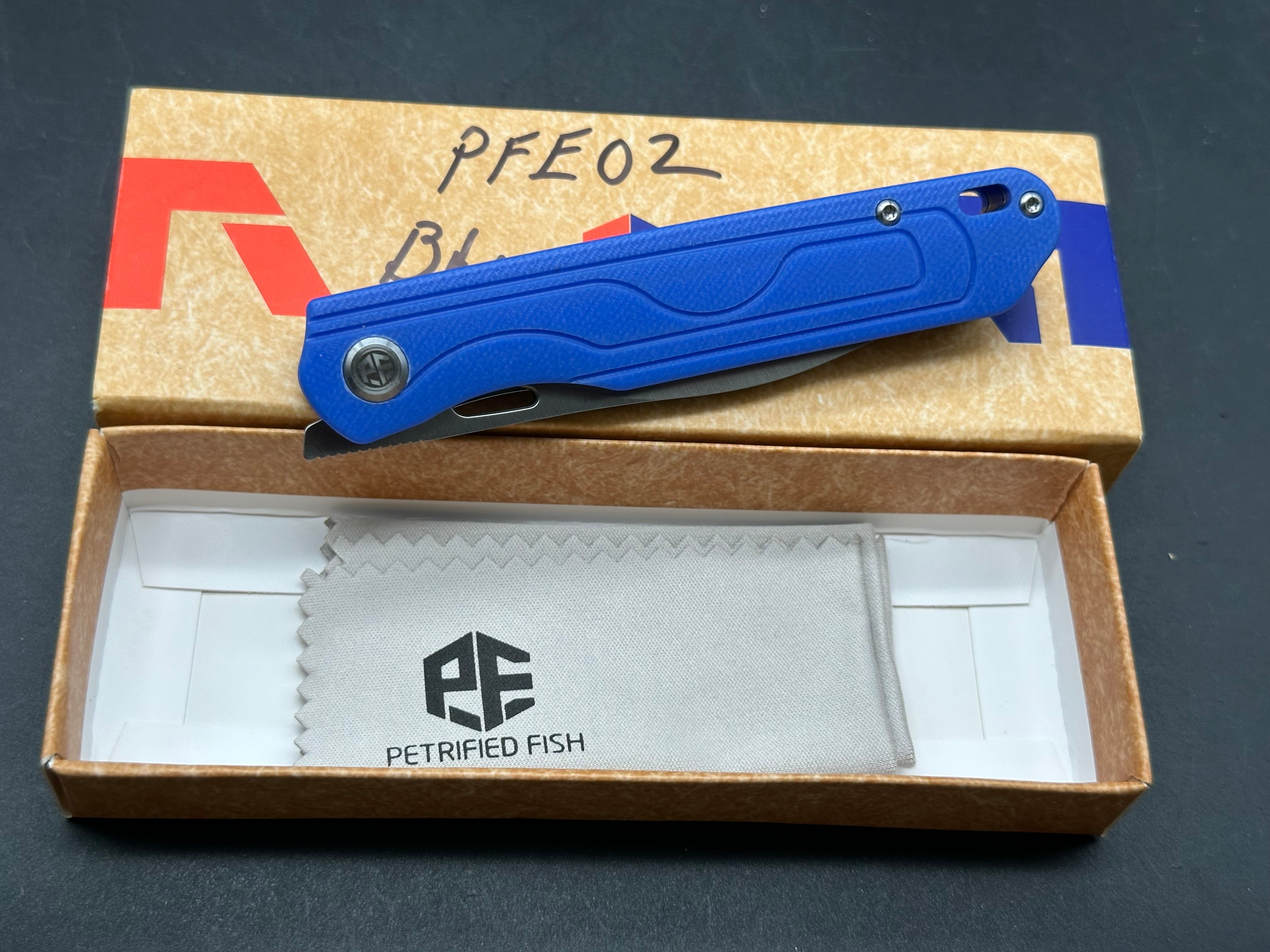 Petrified Fish PFE02 SCOUT 14C28N Satin Blade Blue G10 Handle