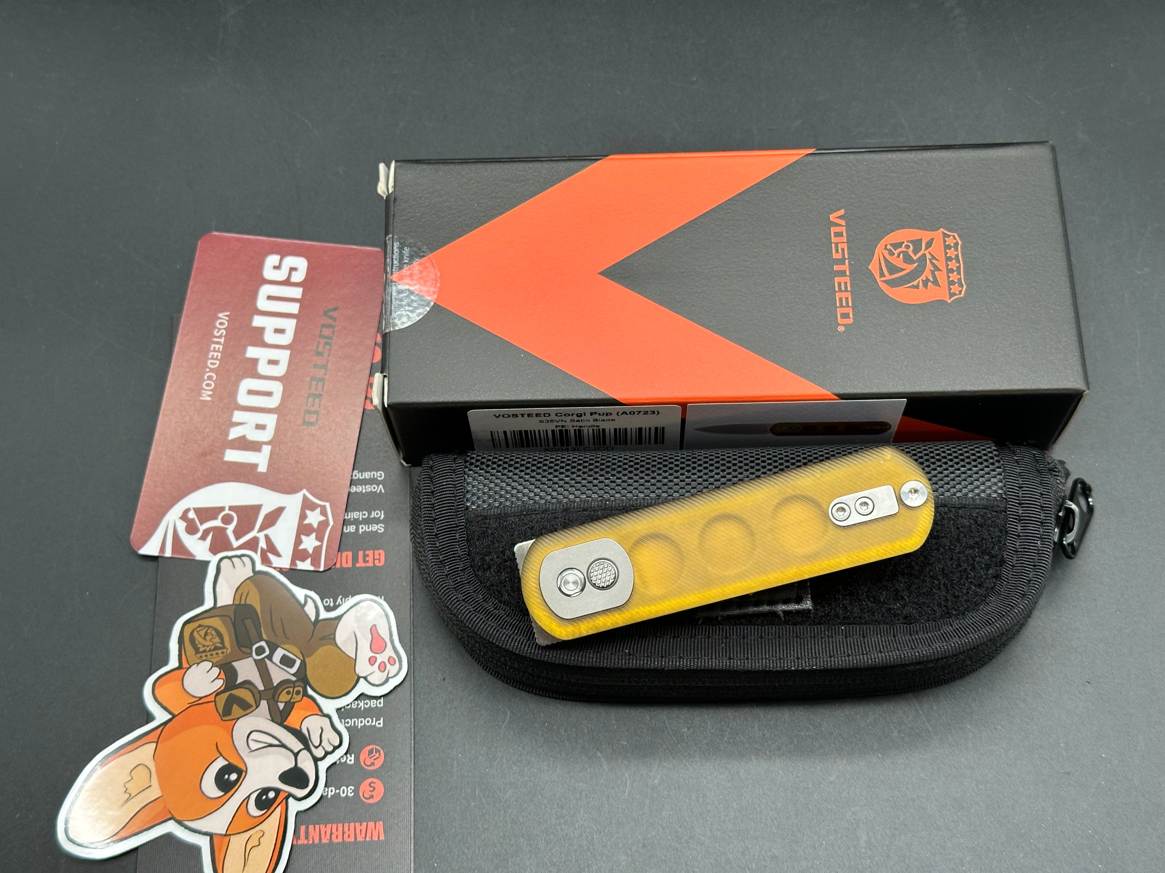 VOSTEED CORGI PUP FOLDING KNIFE AMBER PEI HANDLE S35VN DROP POINT PLAIN EDGE