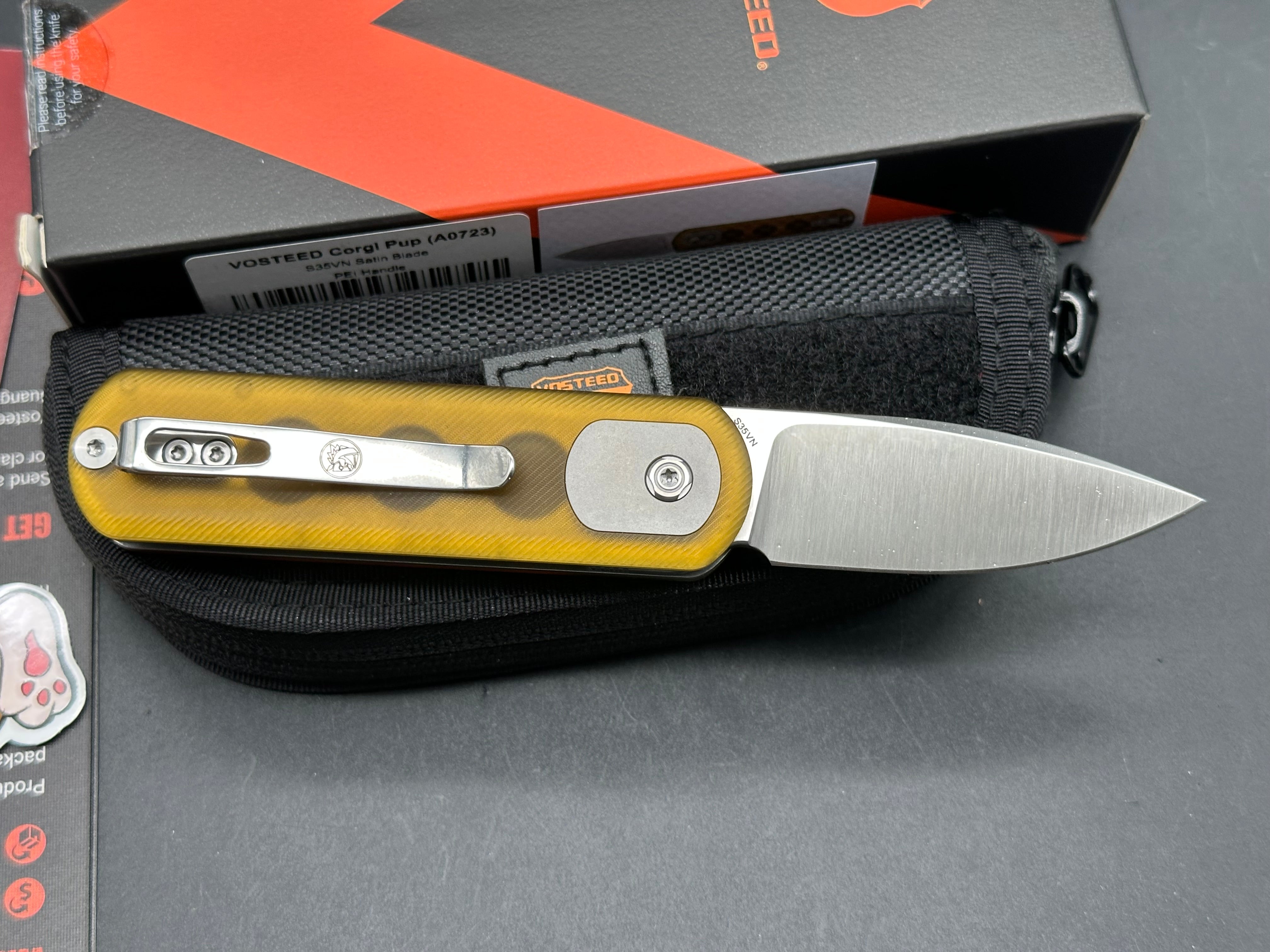 VOSTEED CORGI PUP FOLDING KNIFE AMBER PEI HANDLE S35VN DROP POINT PLAIN EDGE