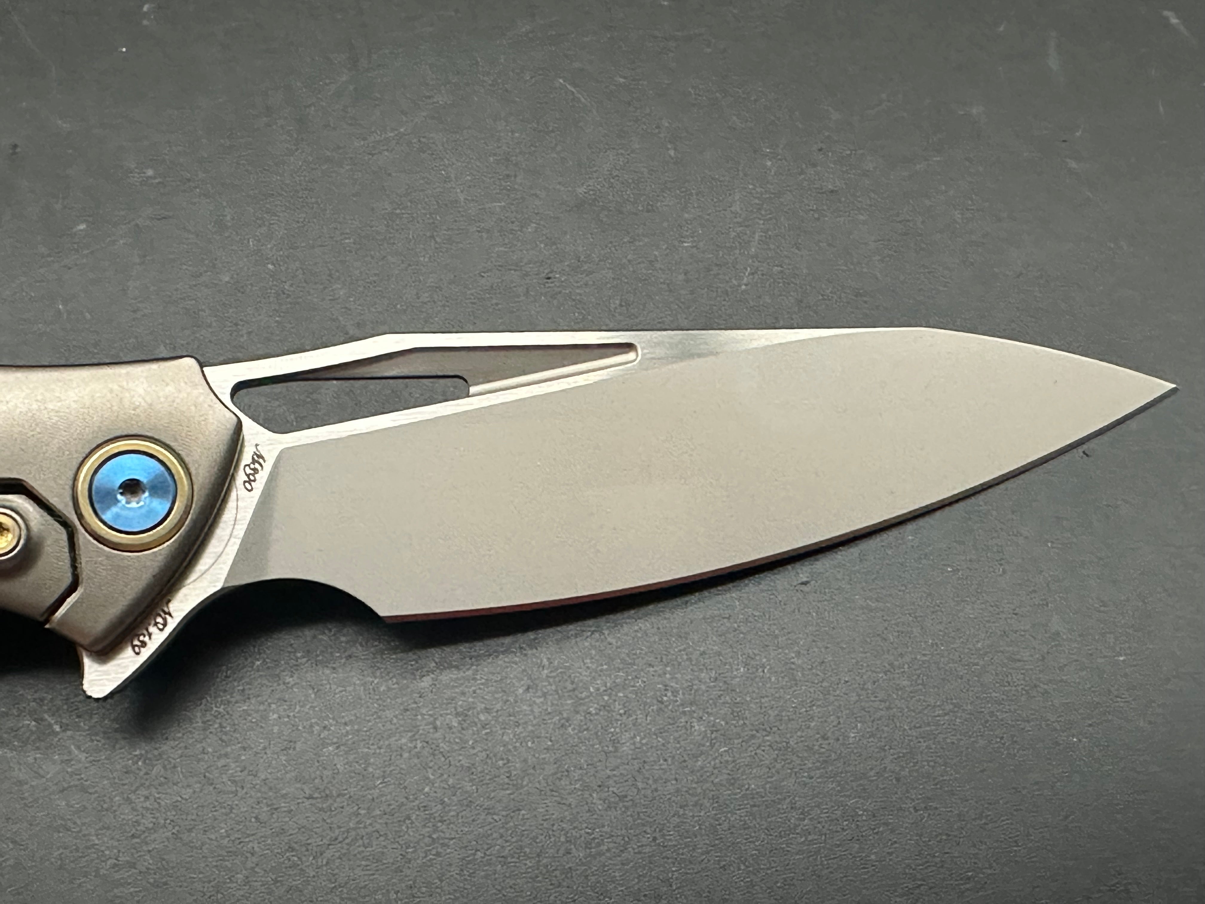 Rike Knife 1902-RCF titanium frame/red carbon fiber scales w/M390 blade