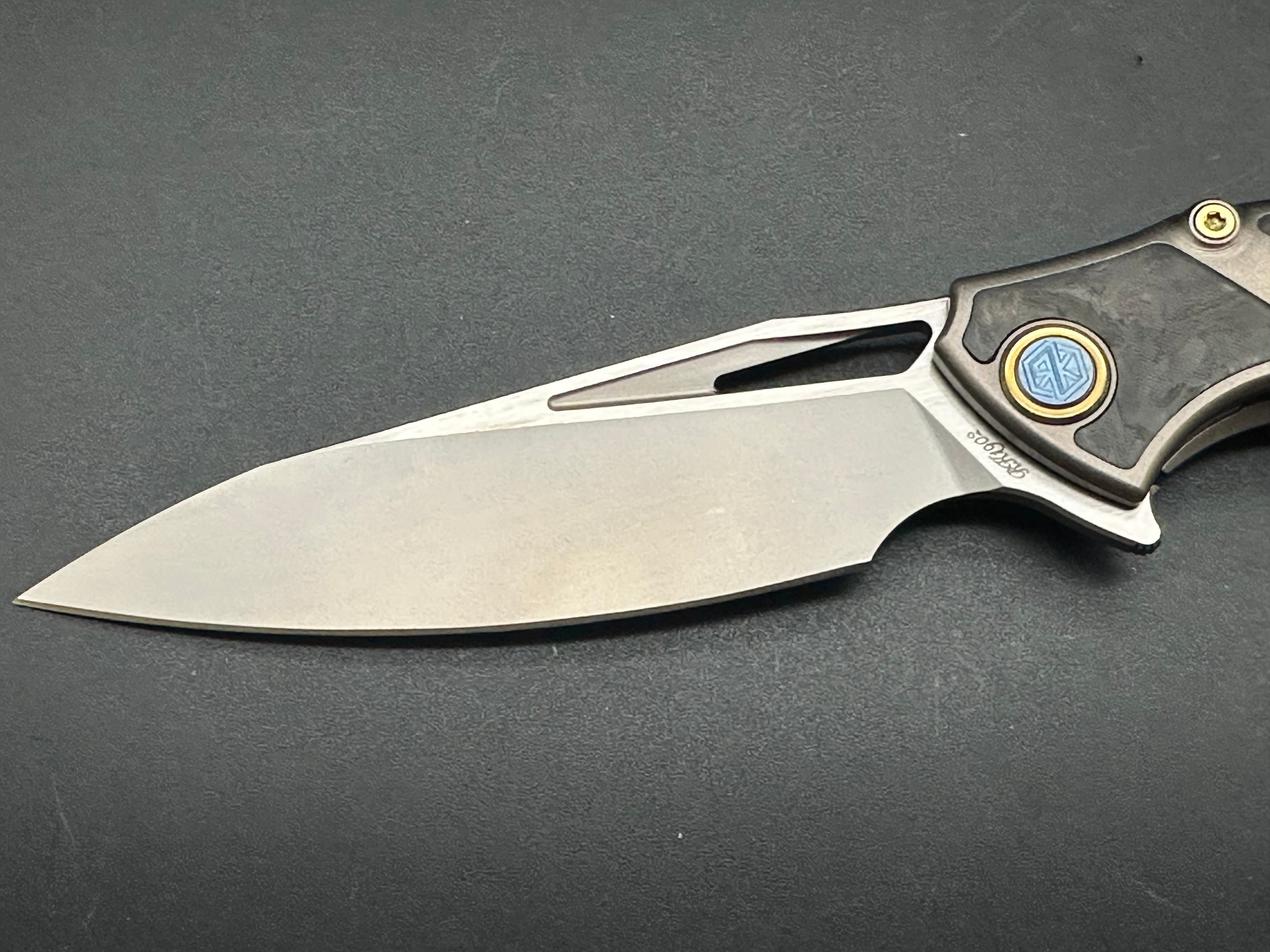 Rike Knife 1902-RCF titanium frame/red carbon fiber scales w/M390 blade