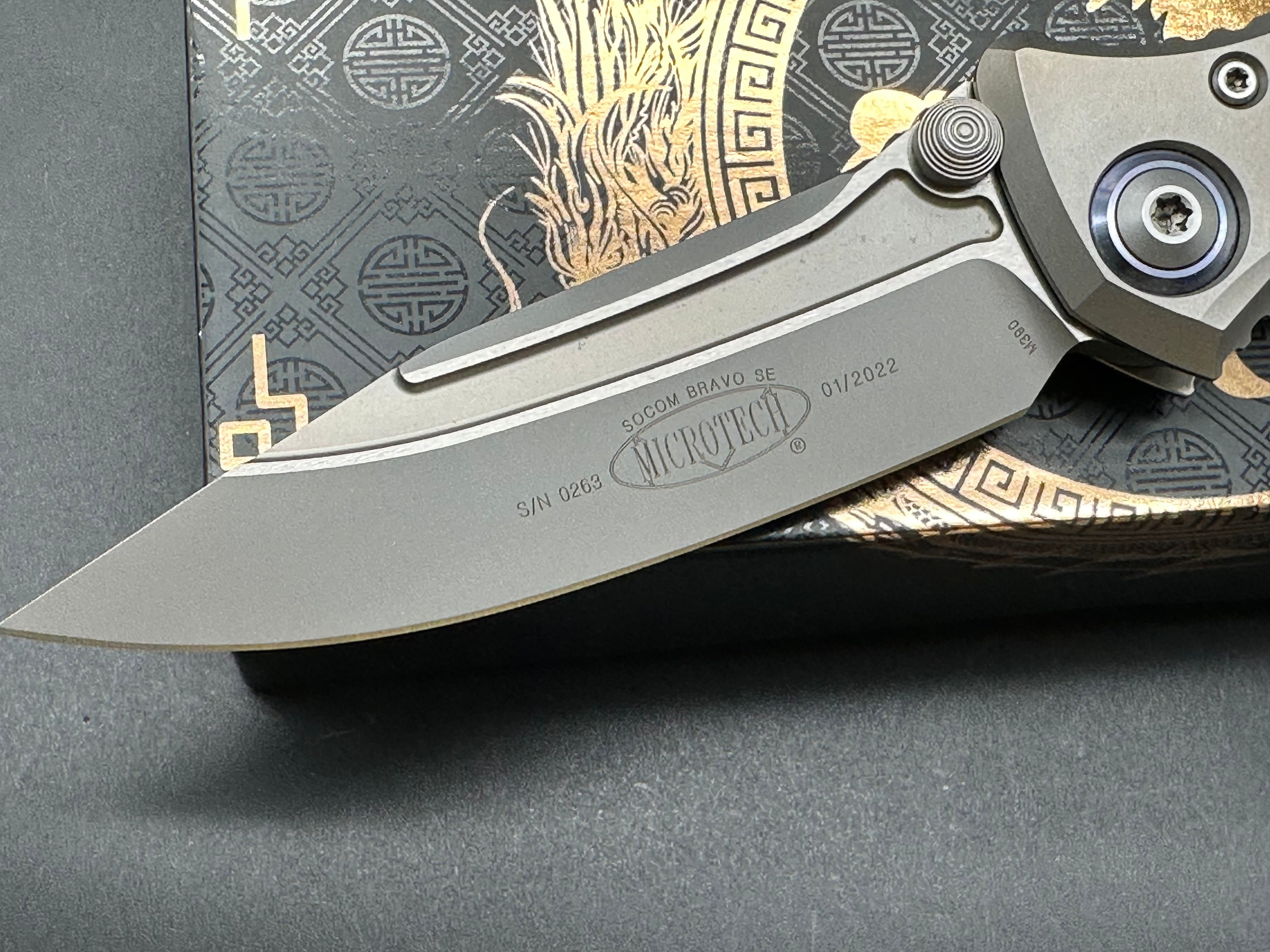 Microtech Socom Bravo Manual Folding Knife 4" M390 Blasted Clip Point Plain Blade, Bolstered Titanium Handles