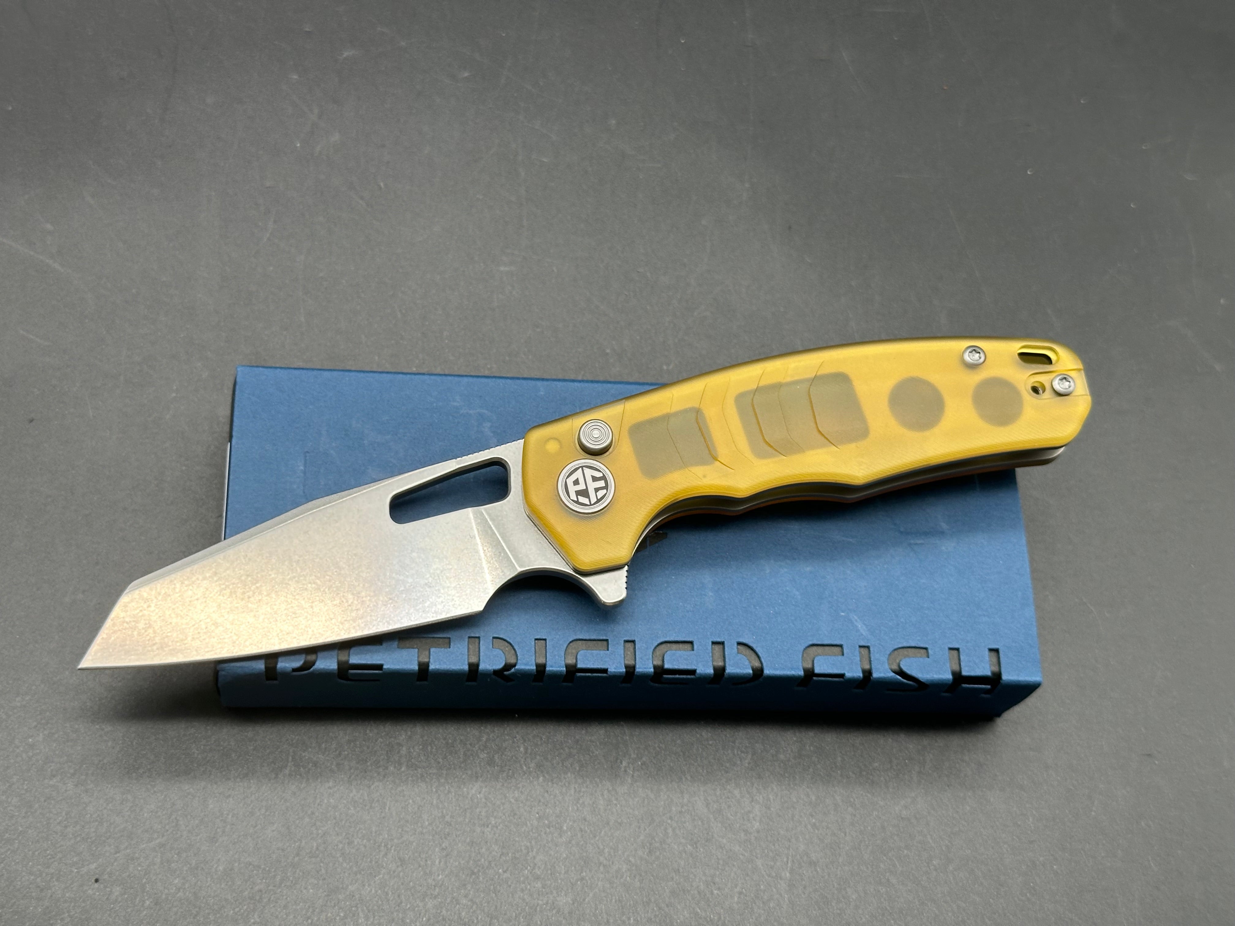 Petrified Fish PFE17 Trilobite 3 inch 14C28N Steel Blade ULTEM Handle Flipper Button lock