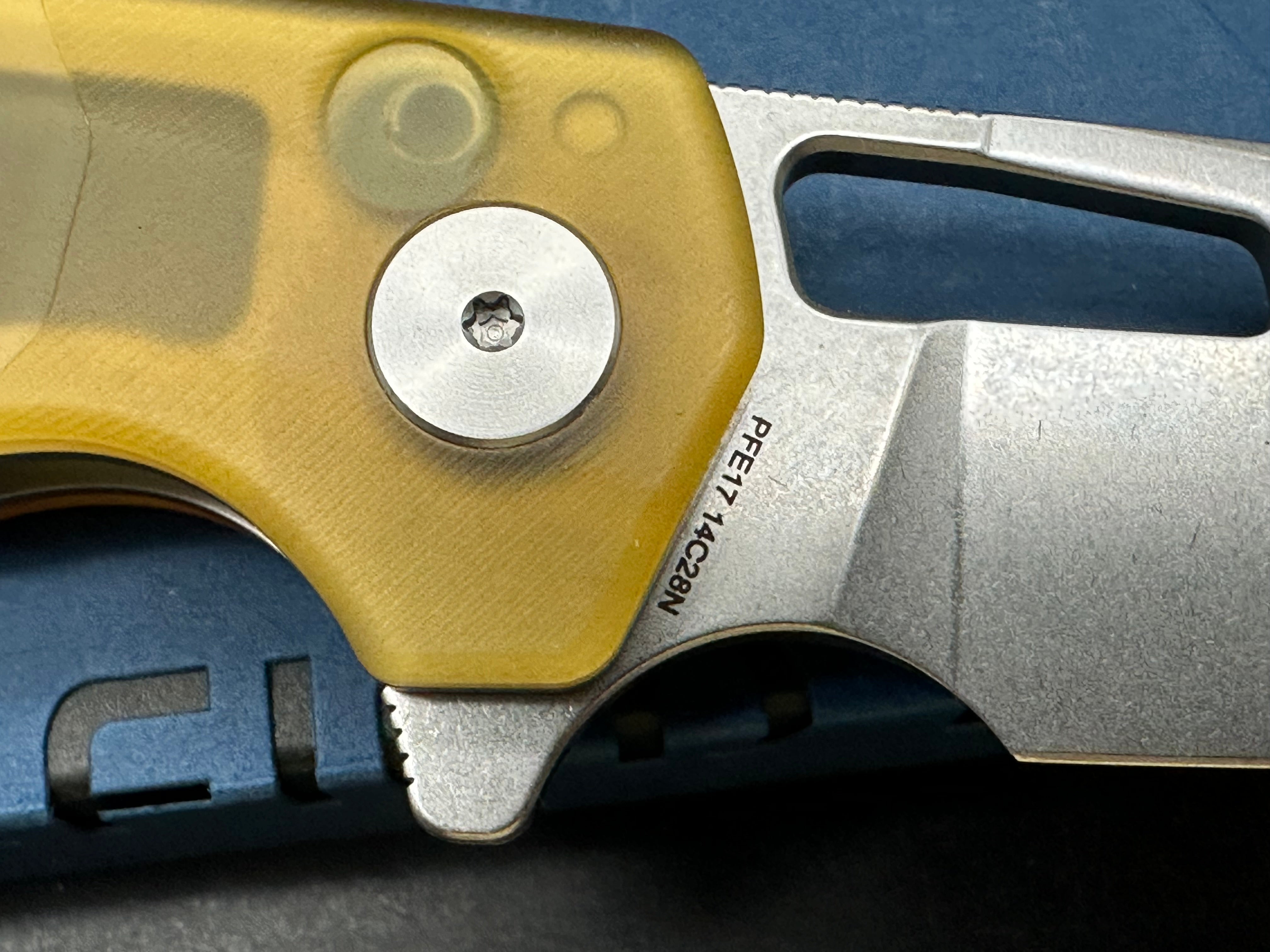 Petrified Fish PFE17 Trilobite 3 inch 14C28N Steel Blade ULTEM Handle Flipper Button lock