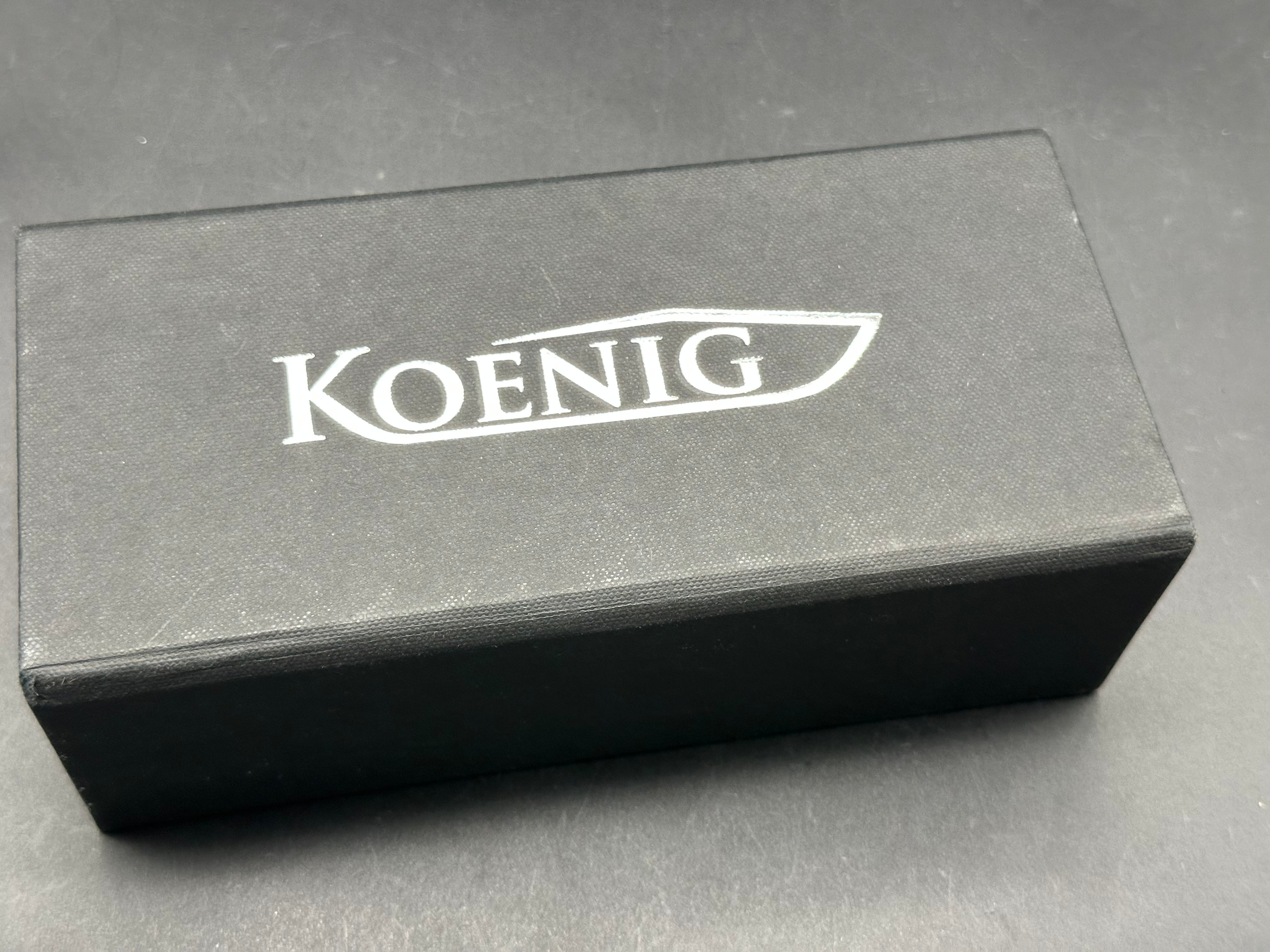 Koenig Arius with M390 Burnished Blade (3.5"), Bead Blast Patterned Ti Blue Hardware