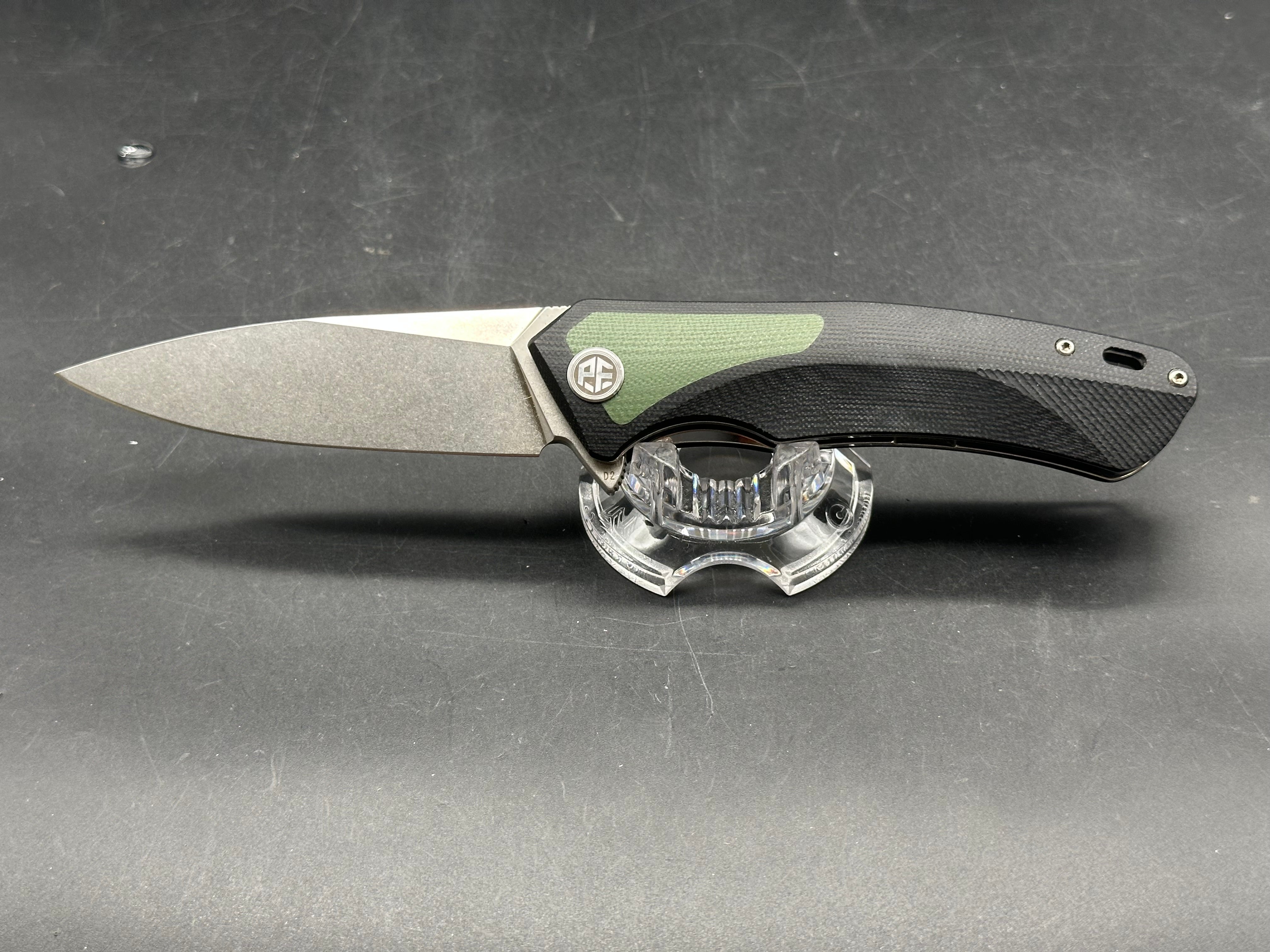 PETRIFIED FISH FOLDING KNIFE BLACK/GREEN G10 HANDLE D2 PLAIN EDGE