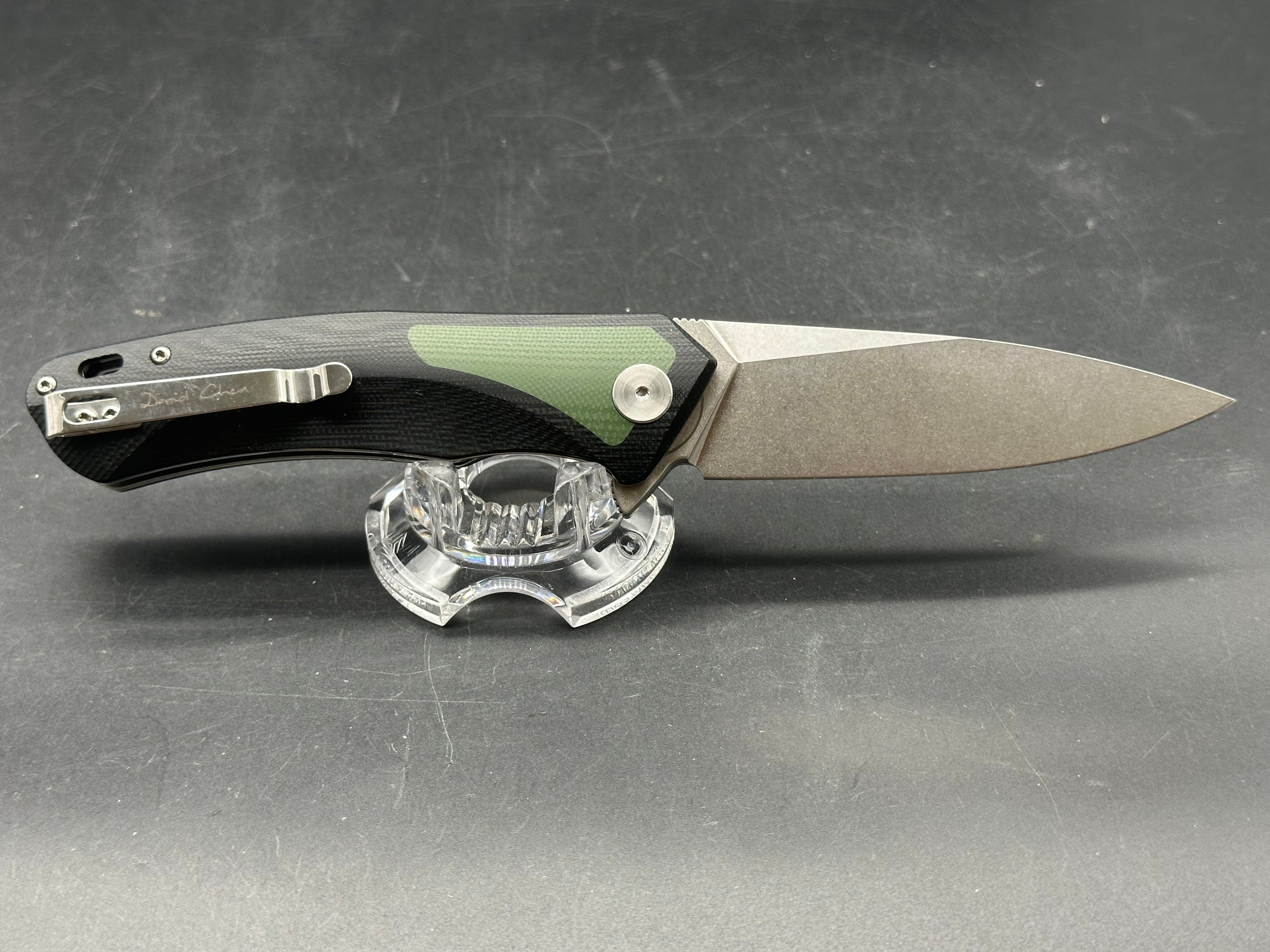 PETRIFIED FISH FOLDING KNIFE BLACK/GREEN G10 HANDLE D2 PLAIN EDGE