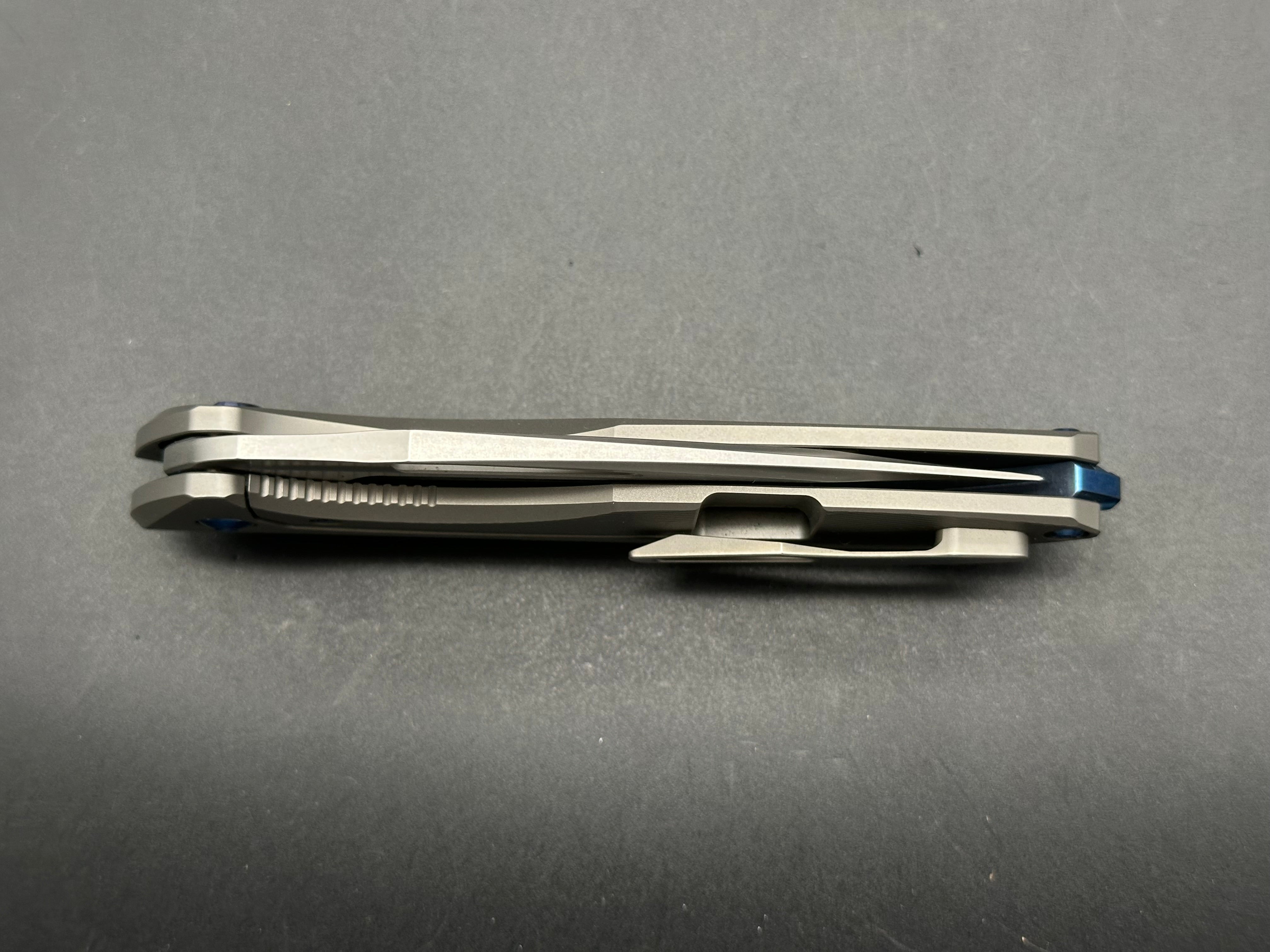 Koenig Arius with M390 Burnished Blade (3.5"), Bead Blast Patterned Ti Blue Hardware