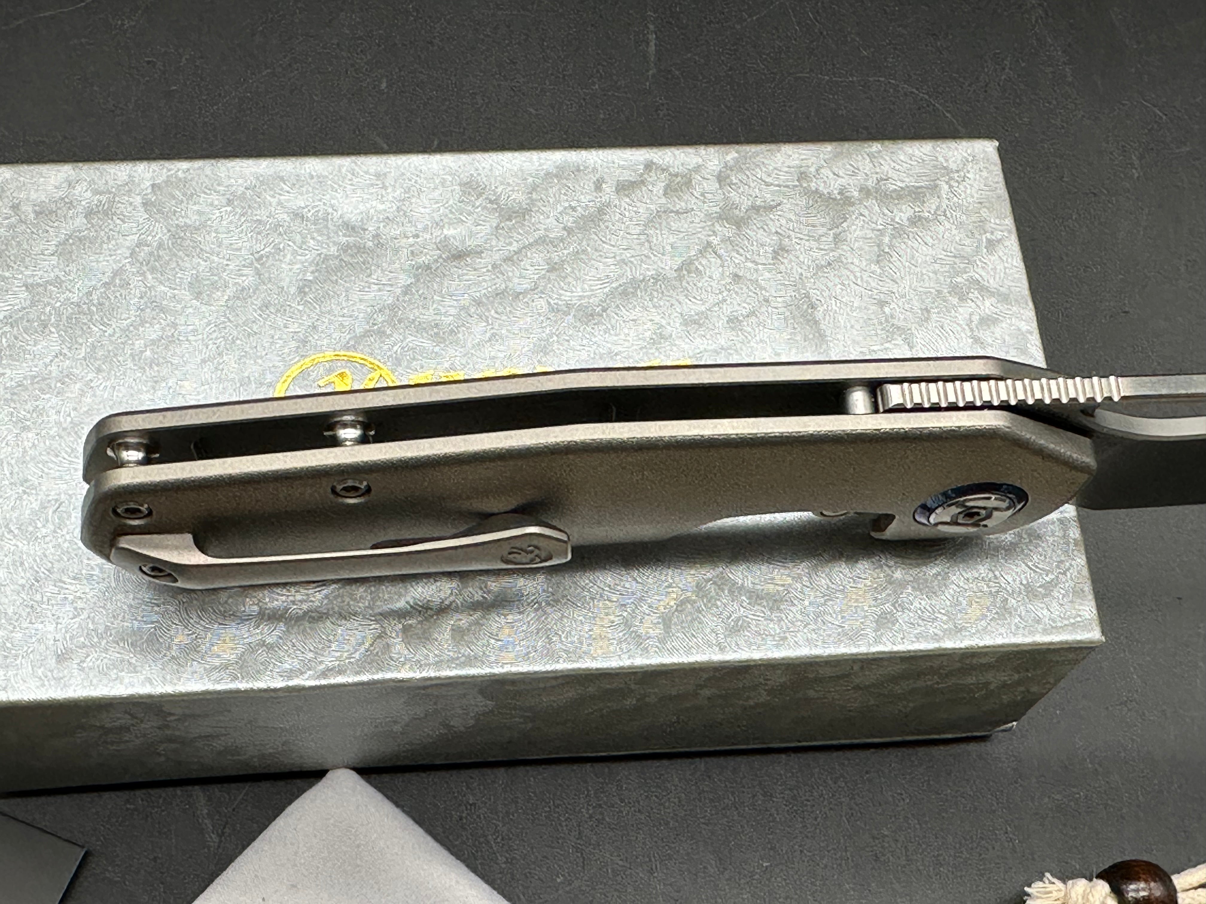 Kunwu S-Tao II (S703L-T2), Satin Vanax Blade, Contoured Ti Handles with Orange Peel Texture, Timascus Pivot Collars, Contoured Ti Pocket Clip