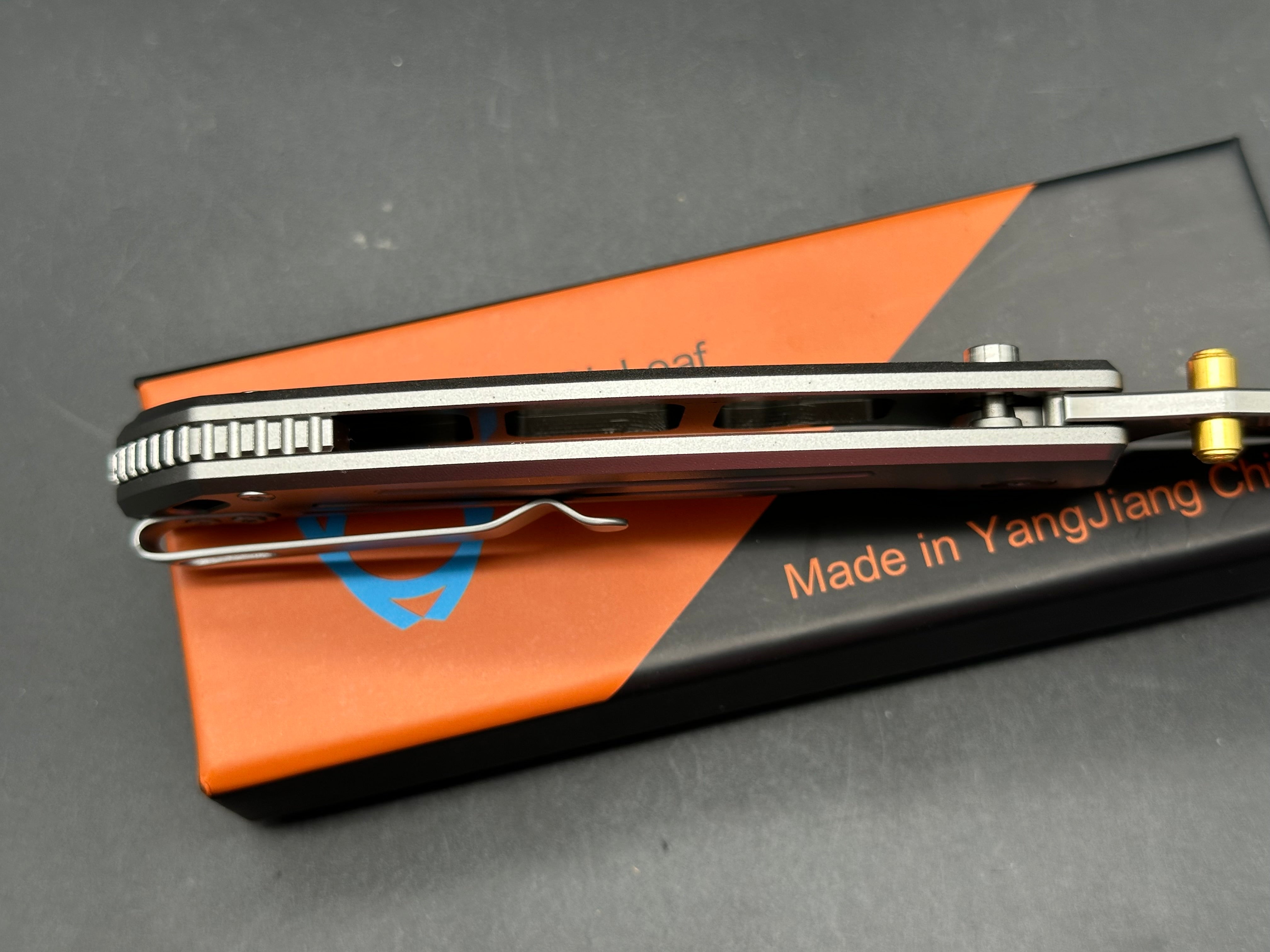 Sixleaf SL-82 button lock, aluminum scales, 14c28n blade