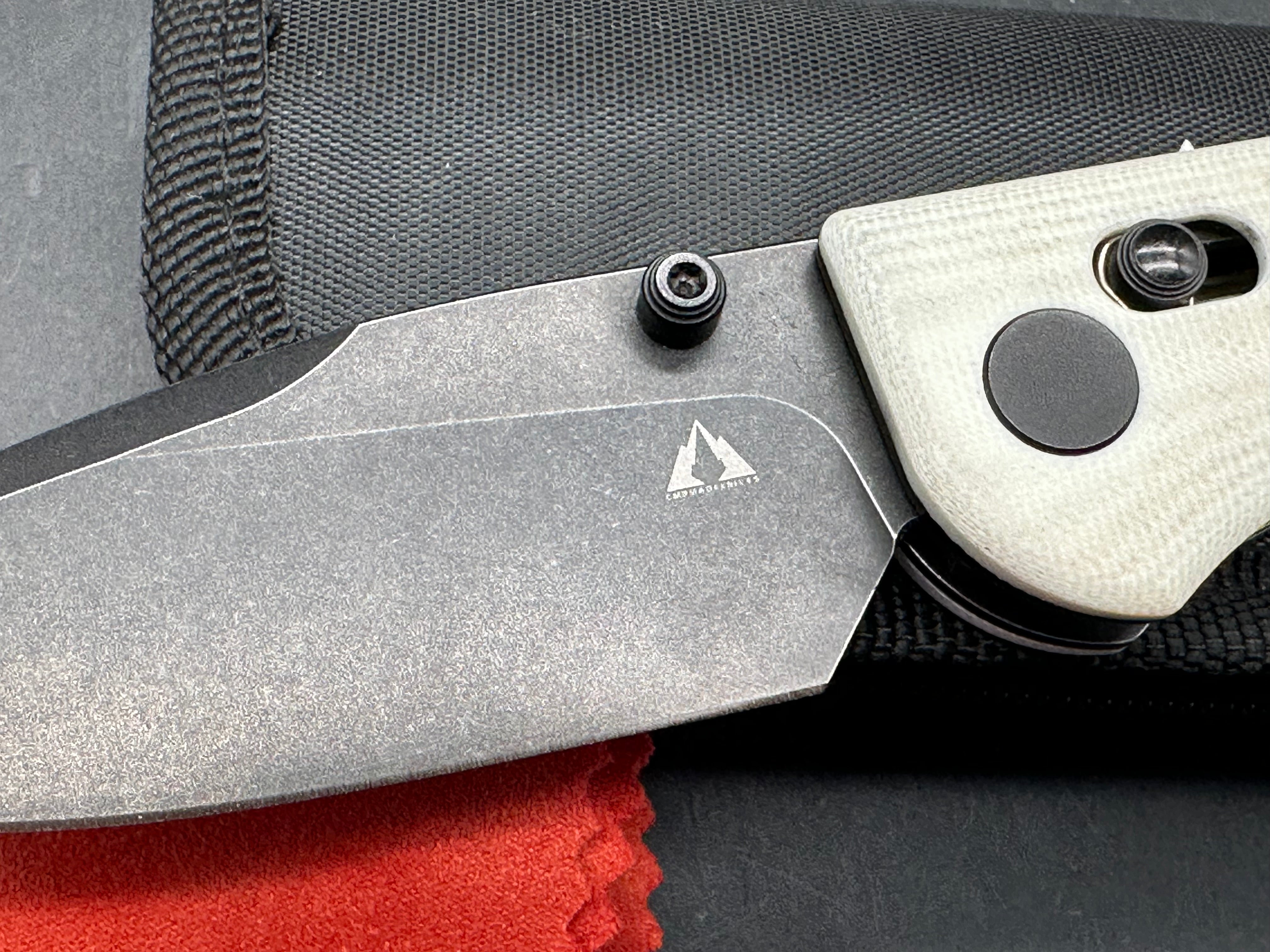 CMB PREDATOR FOLDING KNIFE WHITE G10 HANDLE 14C28N PLAIN EDGE BLACK STONEWASH FINISH