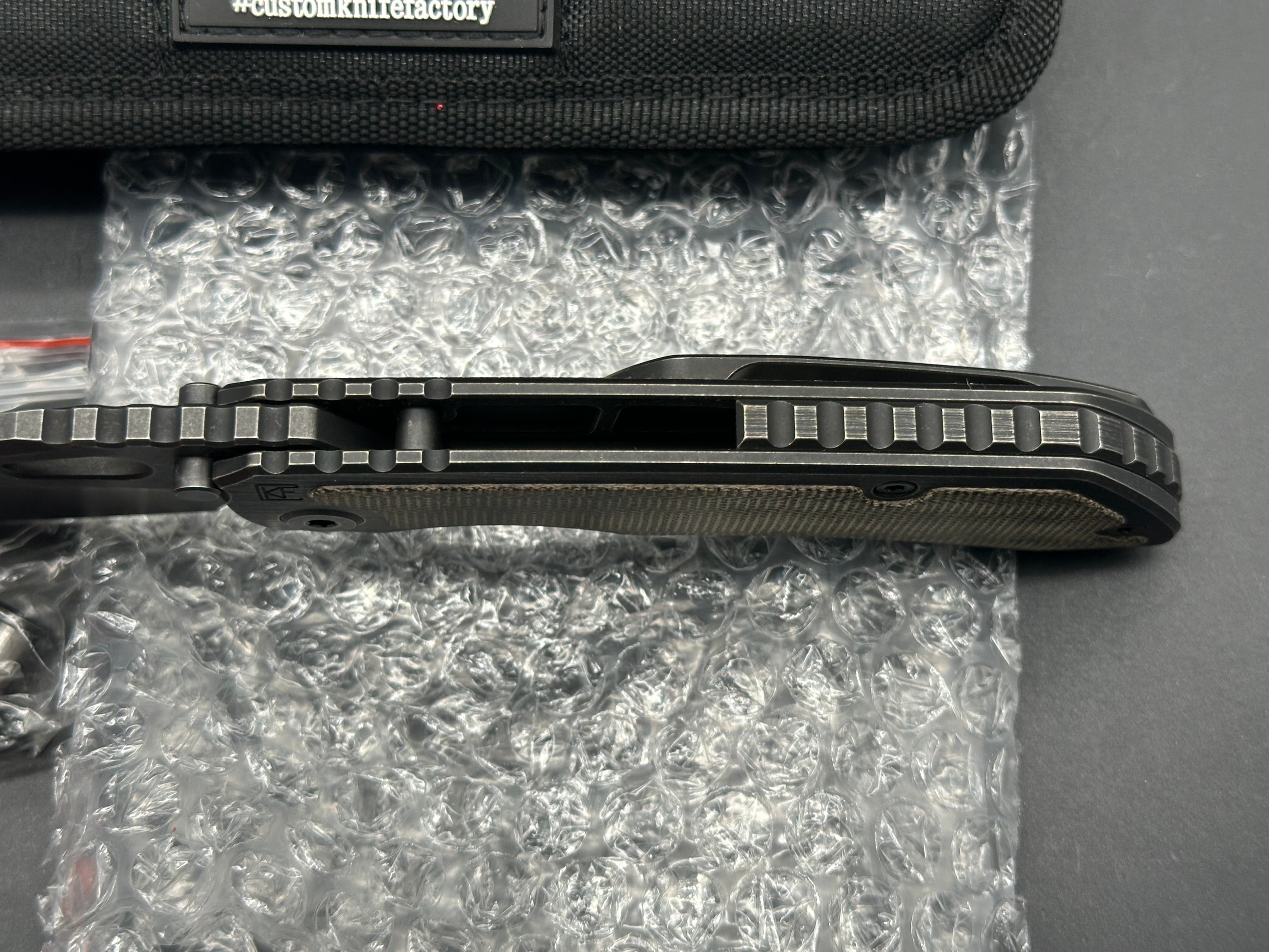 (Custom Knife Factory) CKF/Rotten EVO 3.0D #544, Hollow Ground M390 Blade, Full Blackwash, OD Green Micarta Inlays