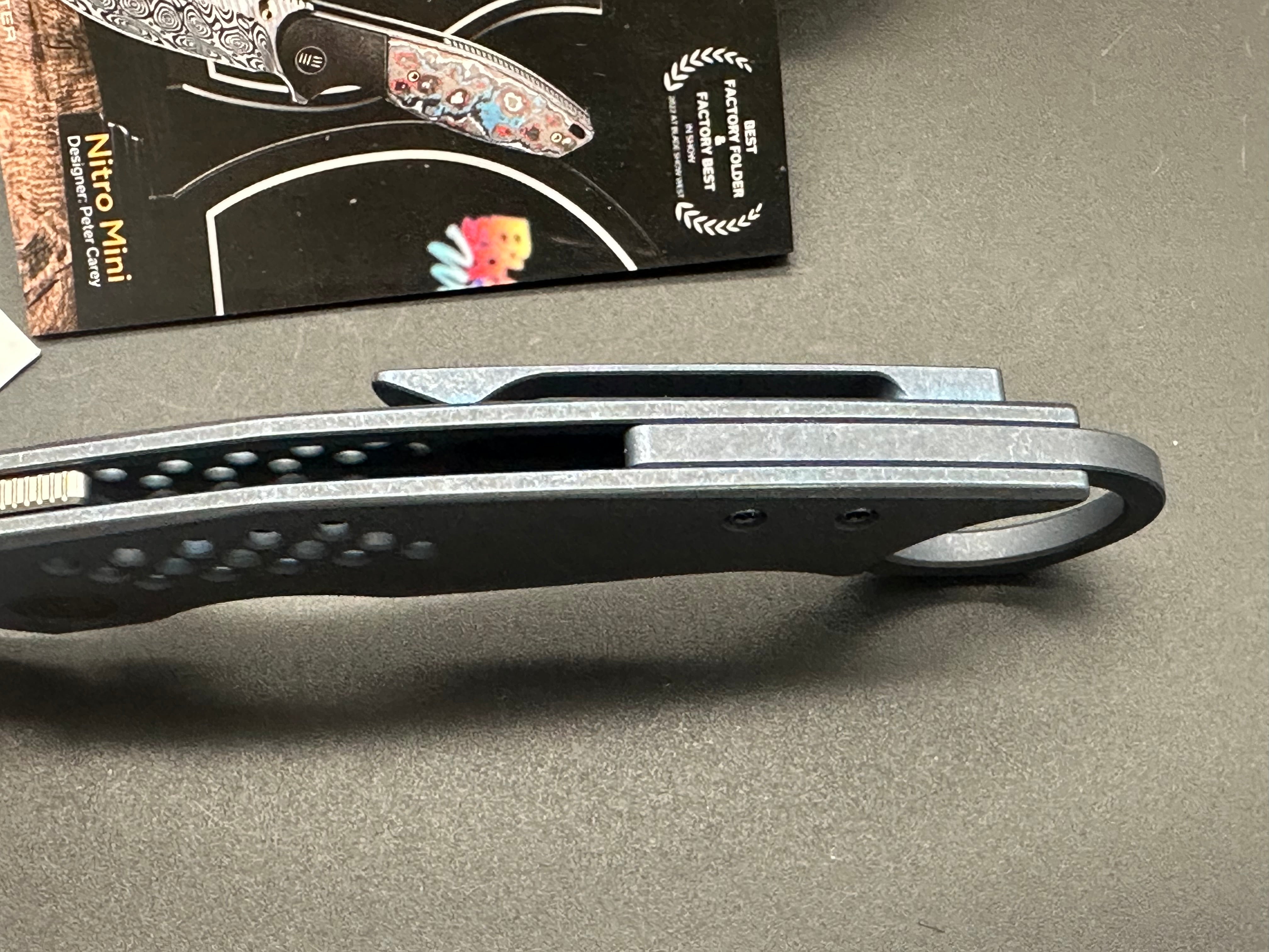 WE ENVISAGE FOLDING KNIFE BLUE TITANIUM HANDLE 20CV DROP POINT