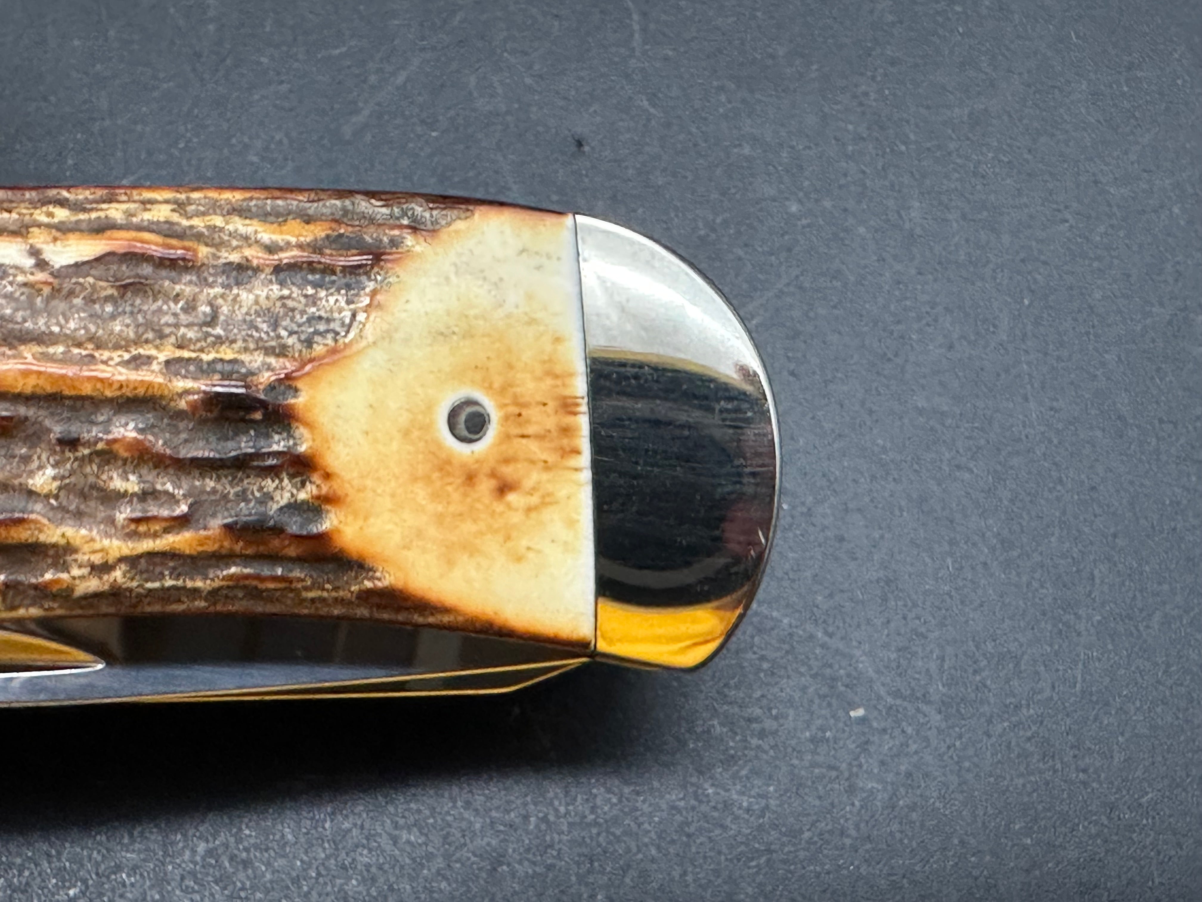 Queen Cutlery USA made. Jumbo Liner lock Trapper (Genuine Stag/ Collector’s Tin) 1095 Carbon steel