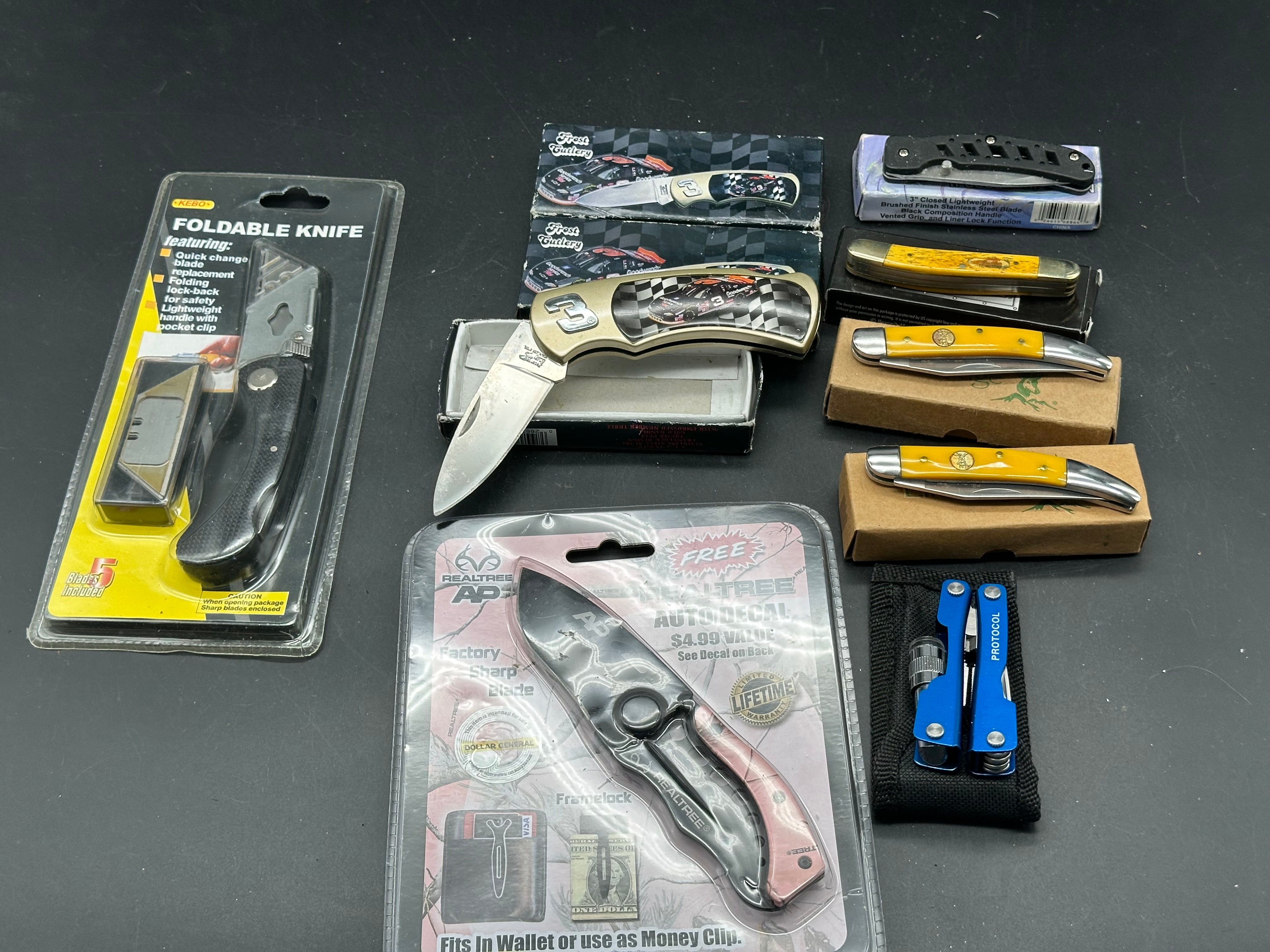 10 knife bundle Check them out ! NASCAR knives