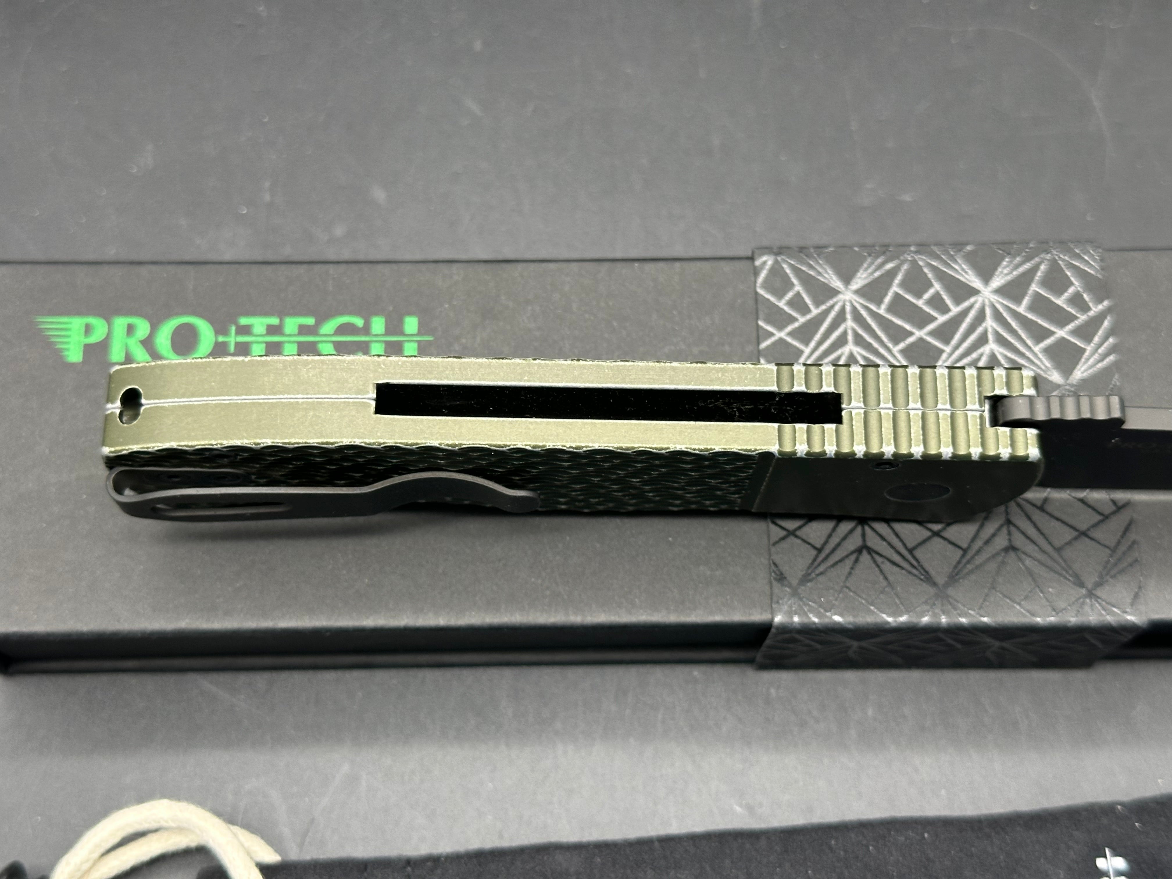 ProTech Emerson Auto CQC-7 Green battle worn textured handle with two tone black/satin blade