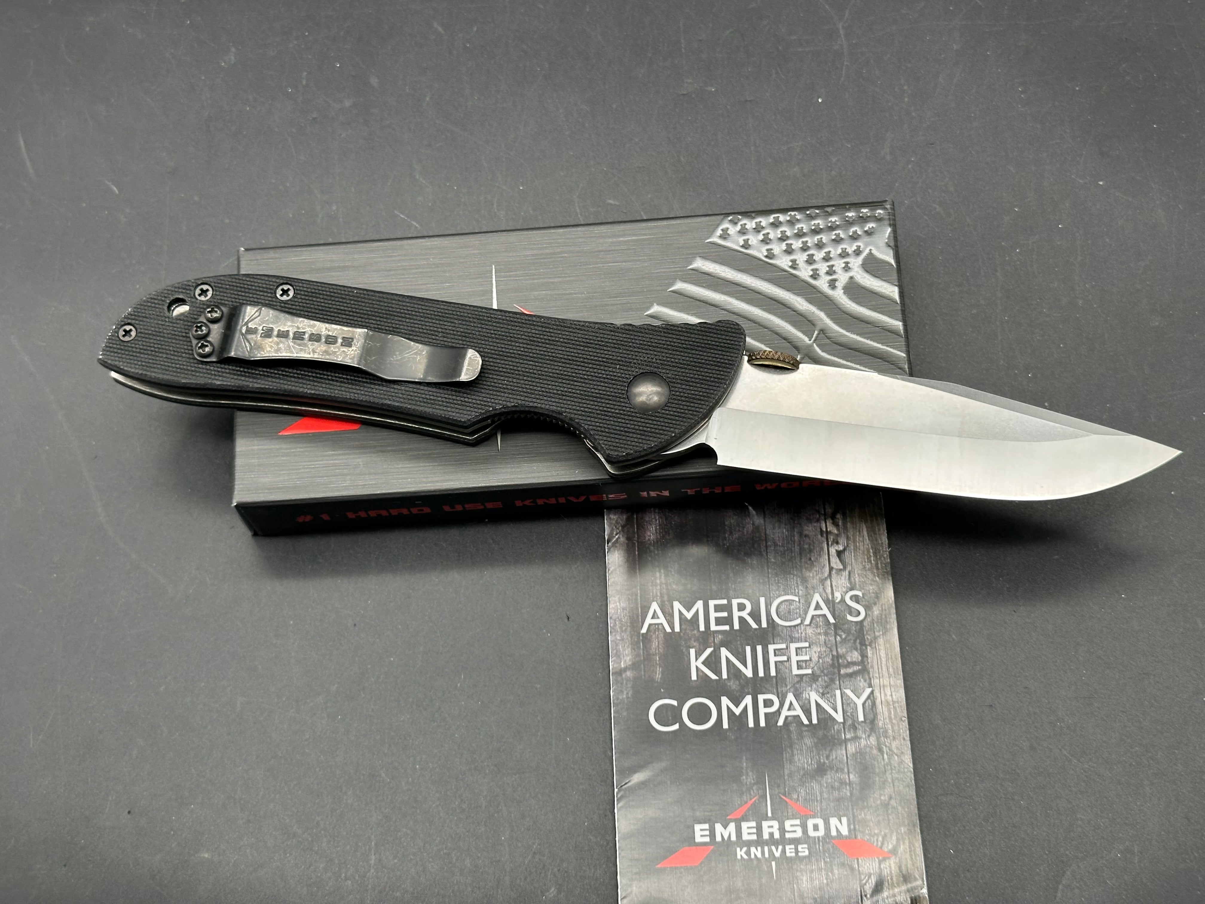Emerson Waved Super Raven A black G10 handle / 154CM