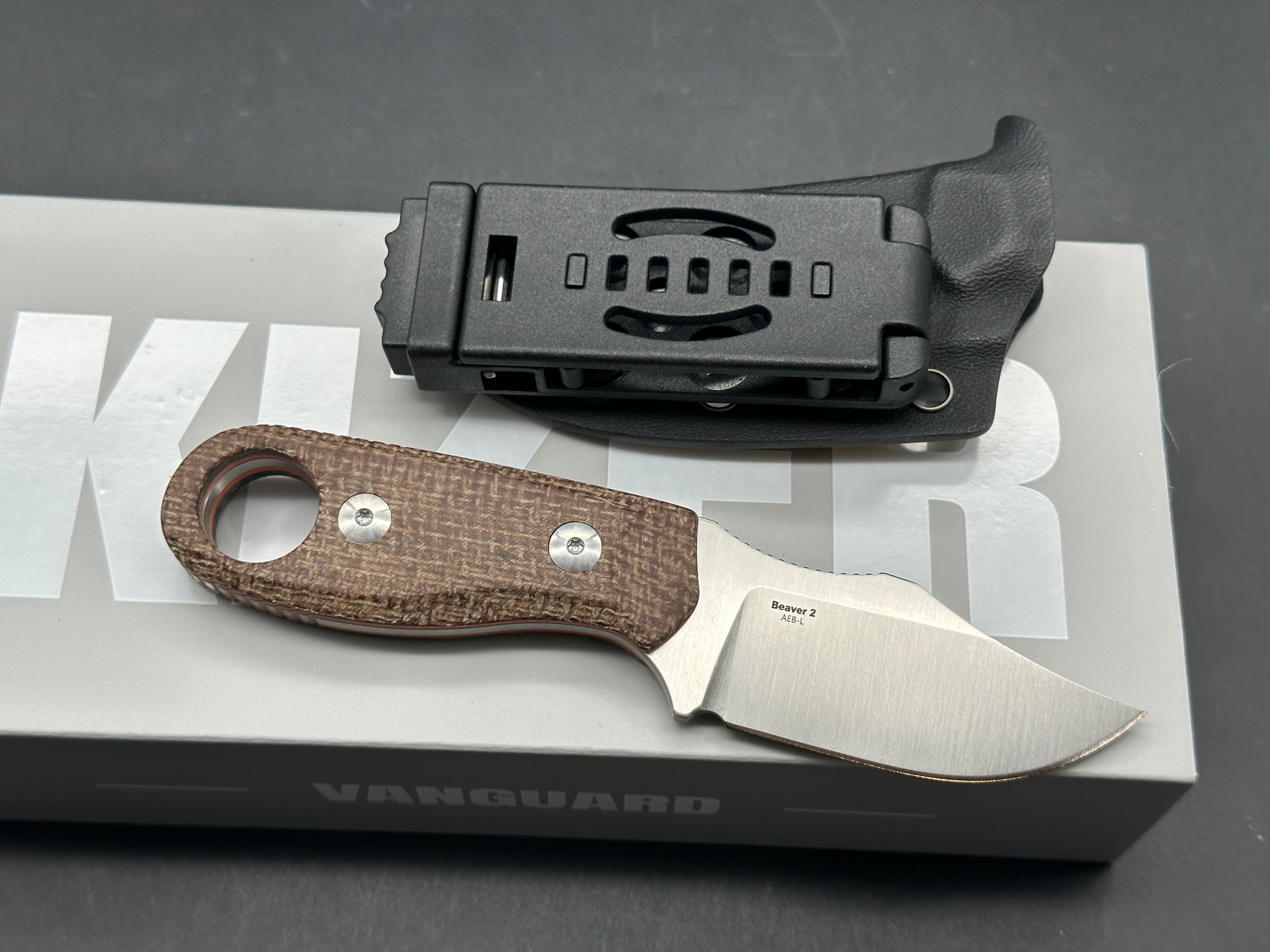 KIZER BEAVER 2 BROWN/ORANGE MICARTA HANDLE AEB-L CLIP POINT PLAIN EDGE SATIN FINISH