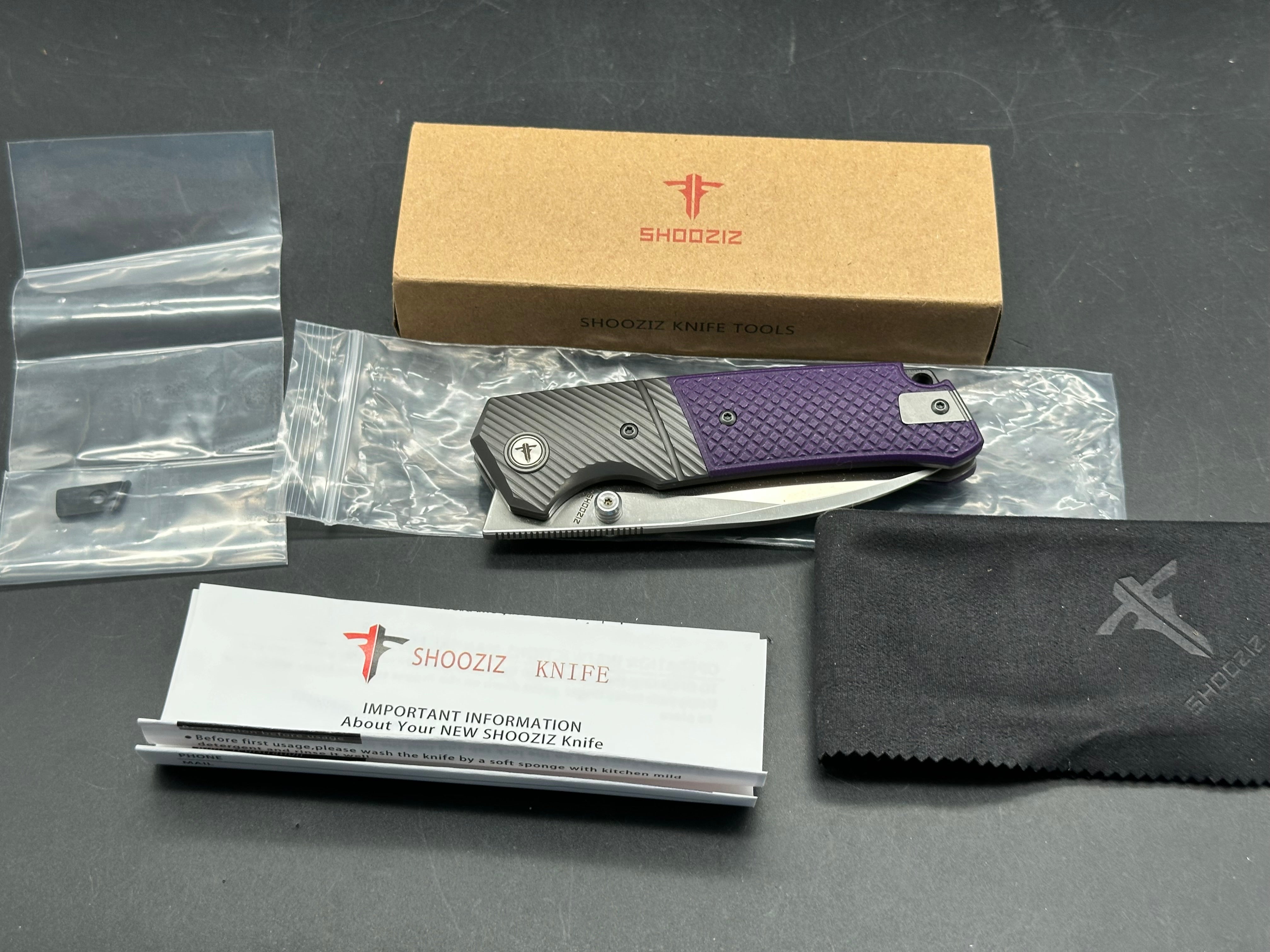 Shooziz XUN 125 folder purple G10 14C28N blade