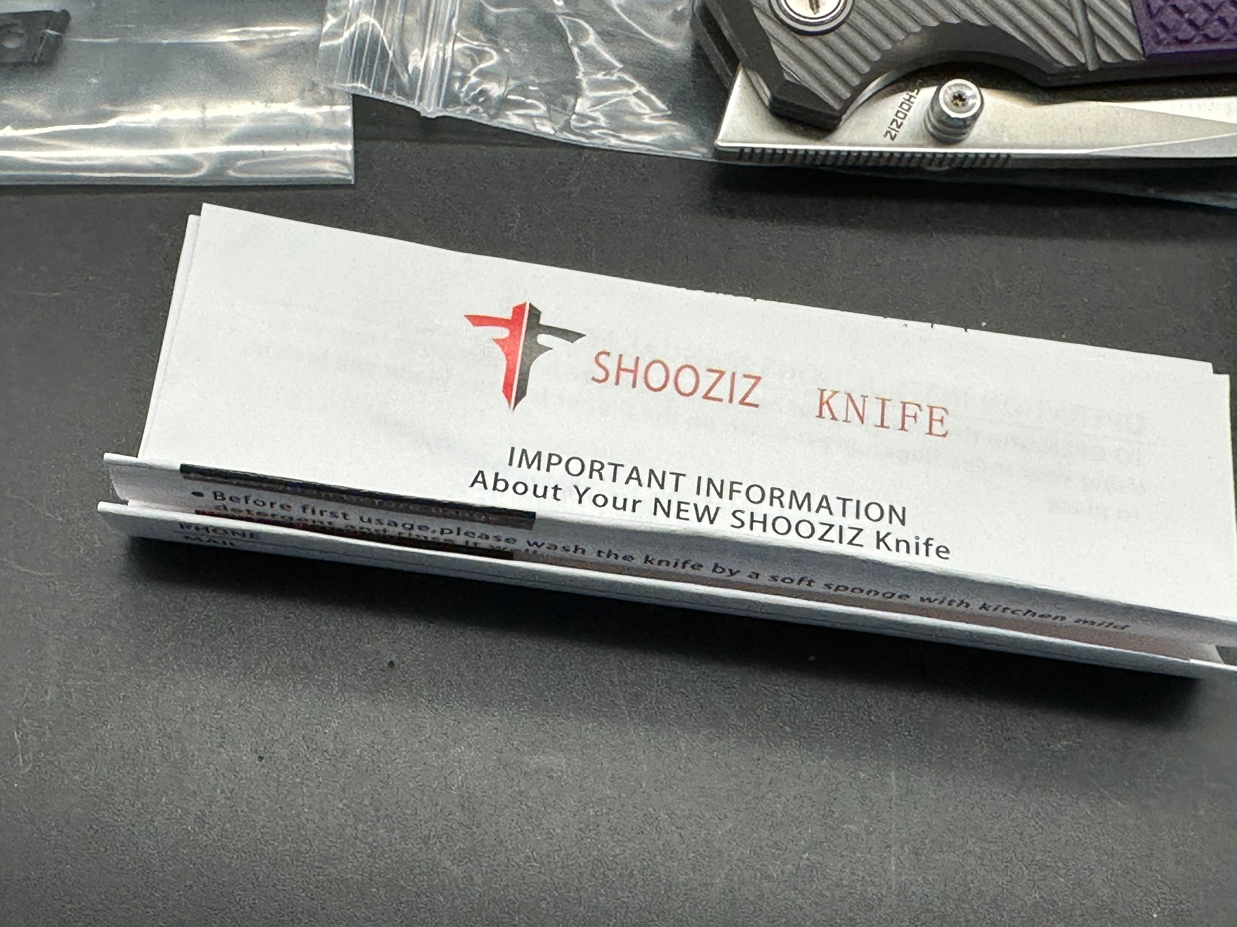 Shooziz XUN 125 folder purple G10 14C28N blade