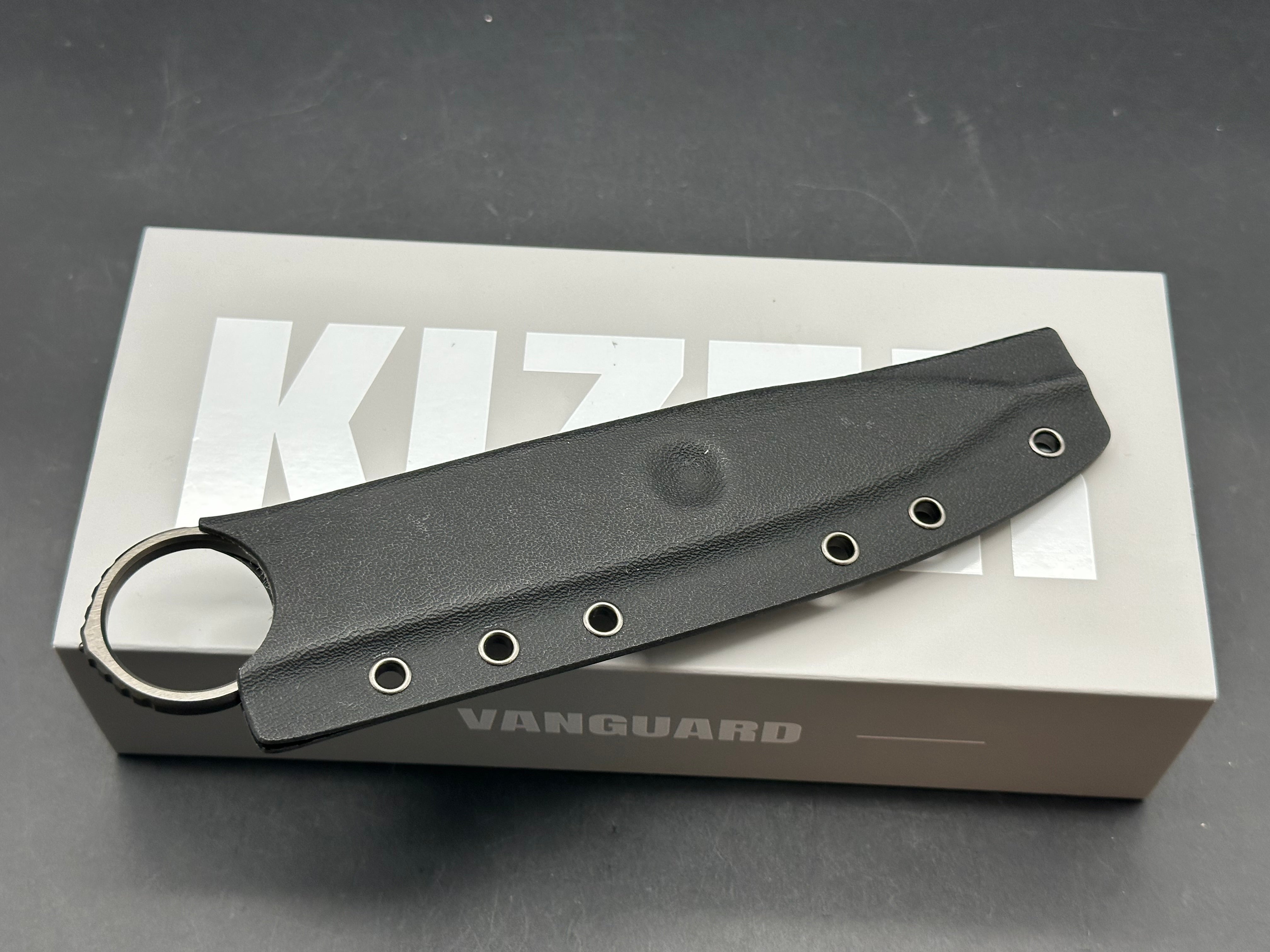 KIZER DEFENSOR M390 HANDLE/BLADE M390 SPEAR POINT PARTIALLY SERRATED EDGE