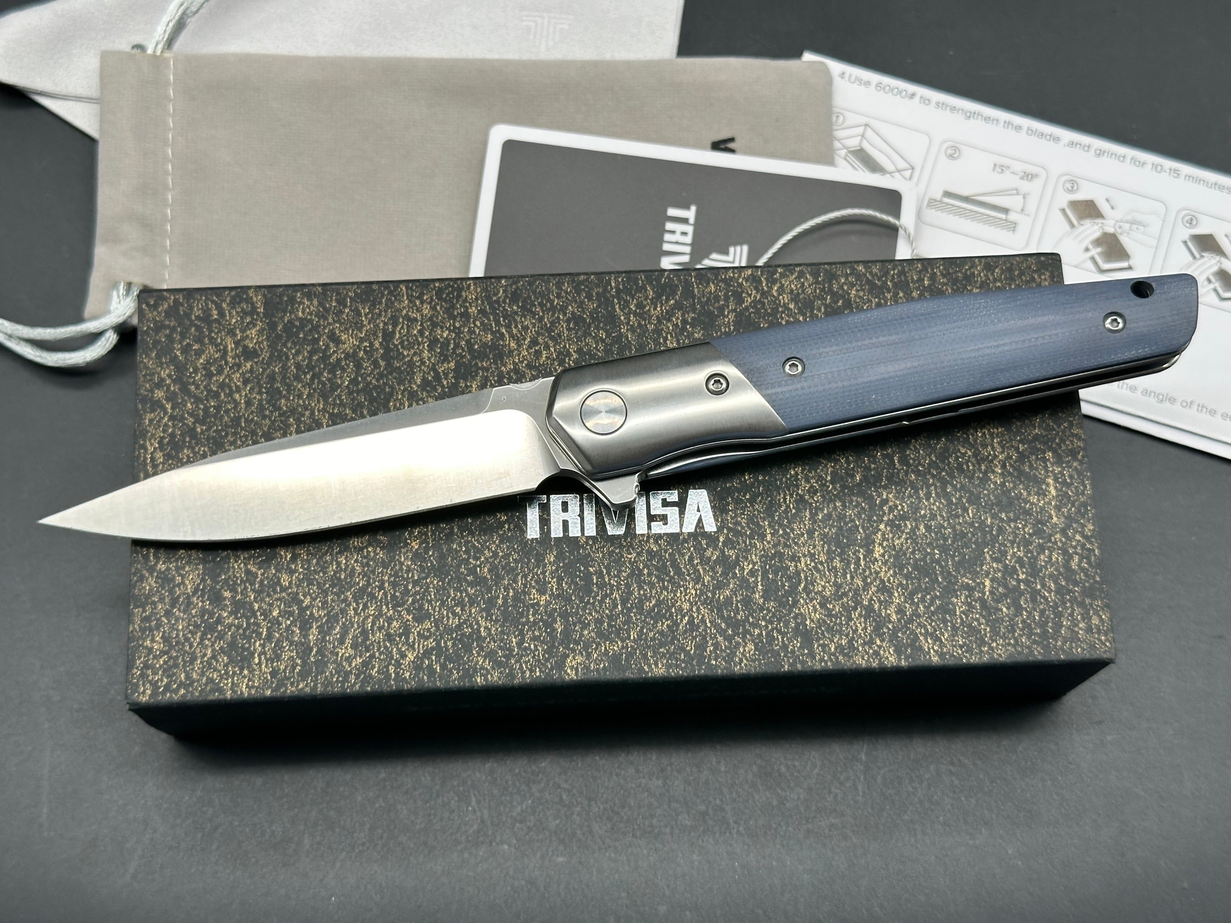 TRIVISA LEOMINOR-03G FOLDING KNIFE BLUE G10 HANDLE K110 PLAIN EDGE SATIN FINISH