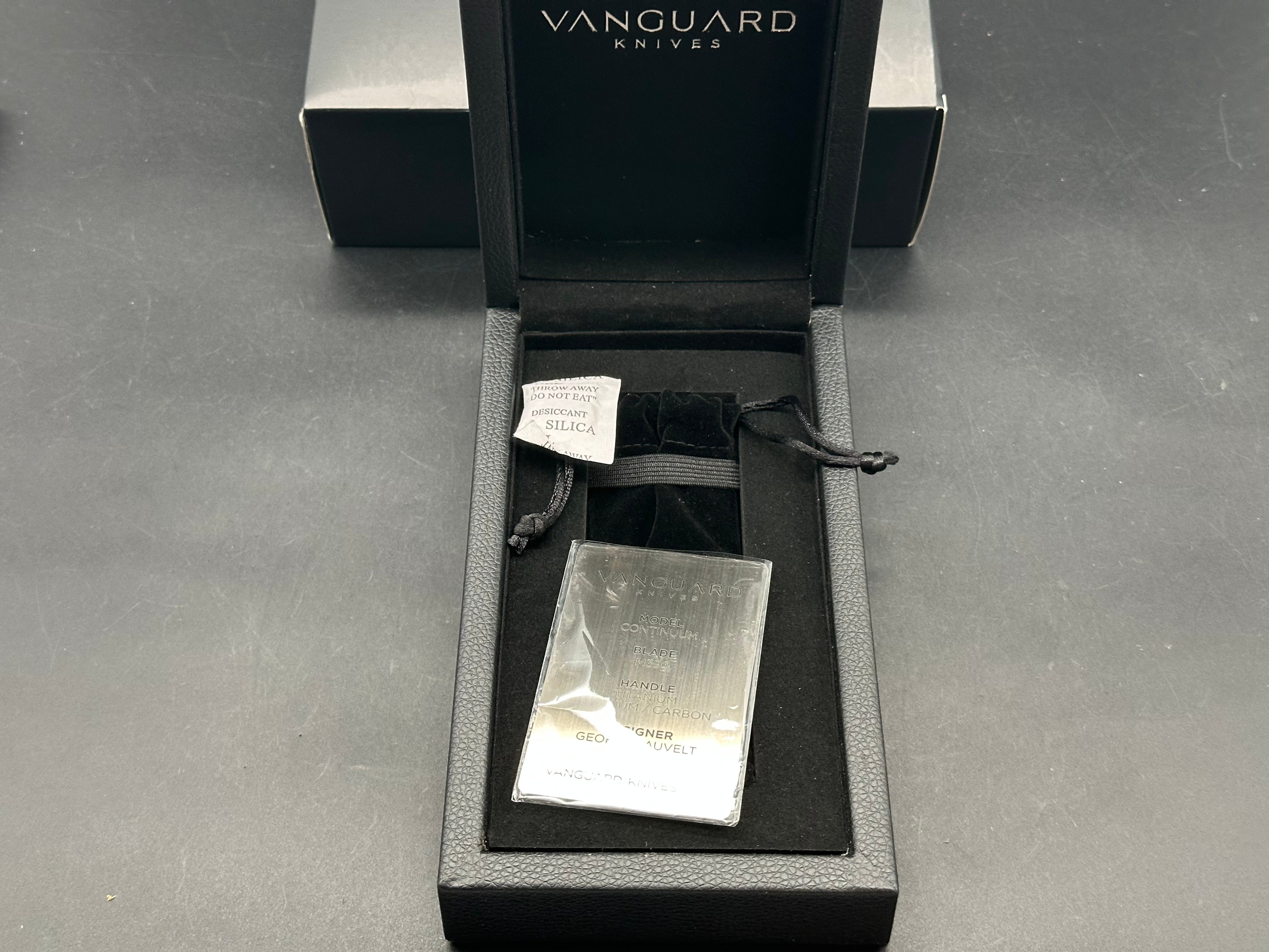Vanguard Continuum, Dark Stonewashed M390 Blade, Flame Anodized Titanium Handles, Dark Blasted Titanium Backspacer and Pocket Clip