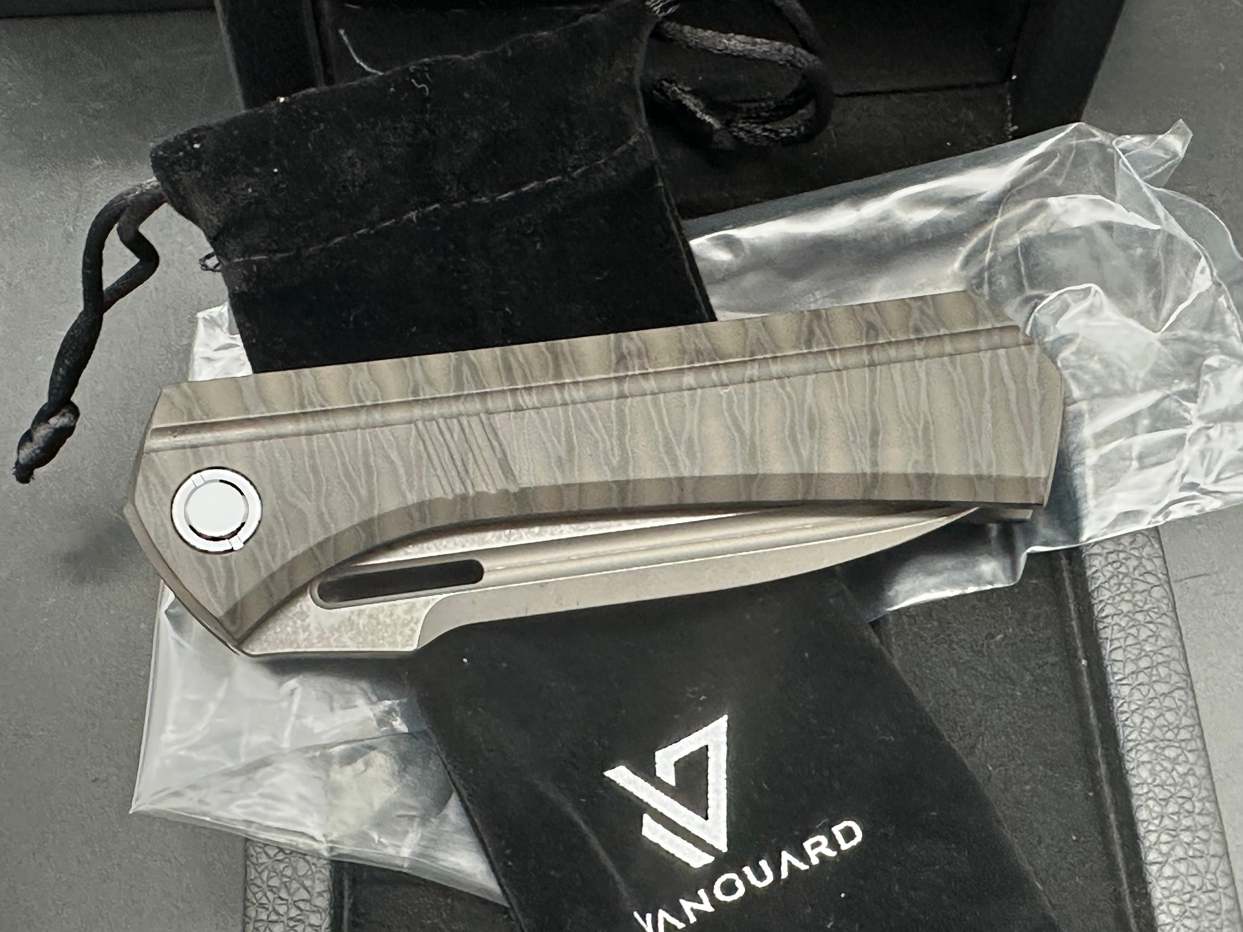 Vanguard Continuum, Dark Stonewashed M390 Blade, Flame Anodized Titanium Handles, Dark Blasted Titanium Backspacer and Pocket Clip