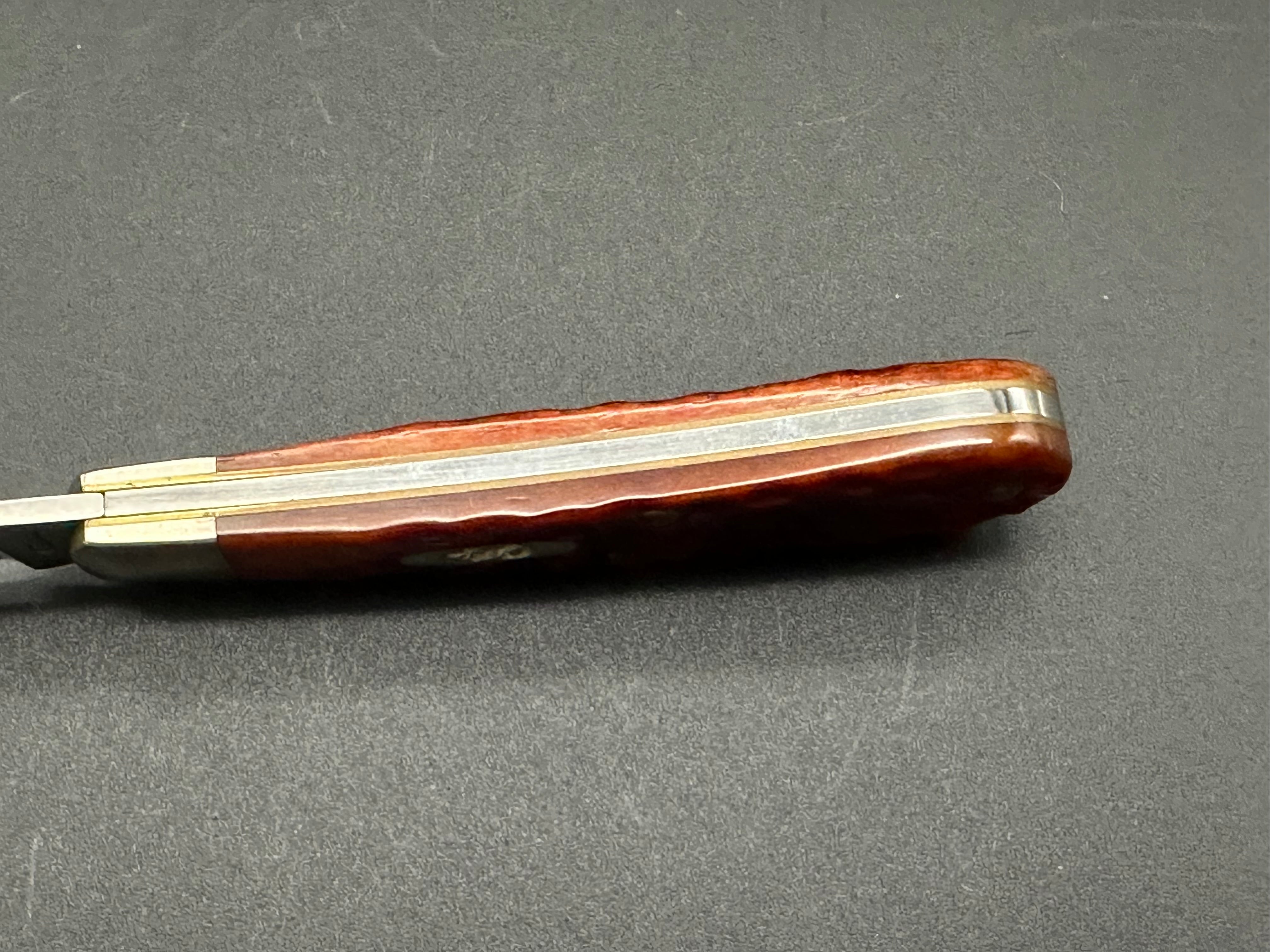 W.R. Case & Sons Swayback slip joint red bone jigged scales