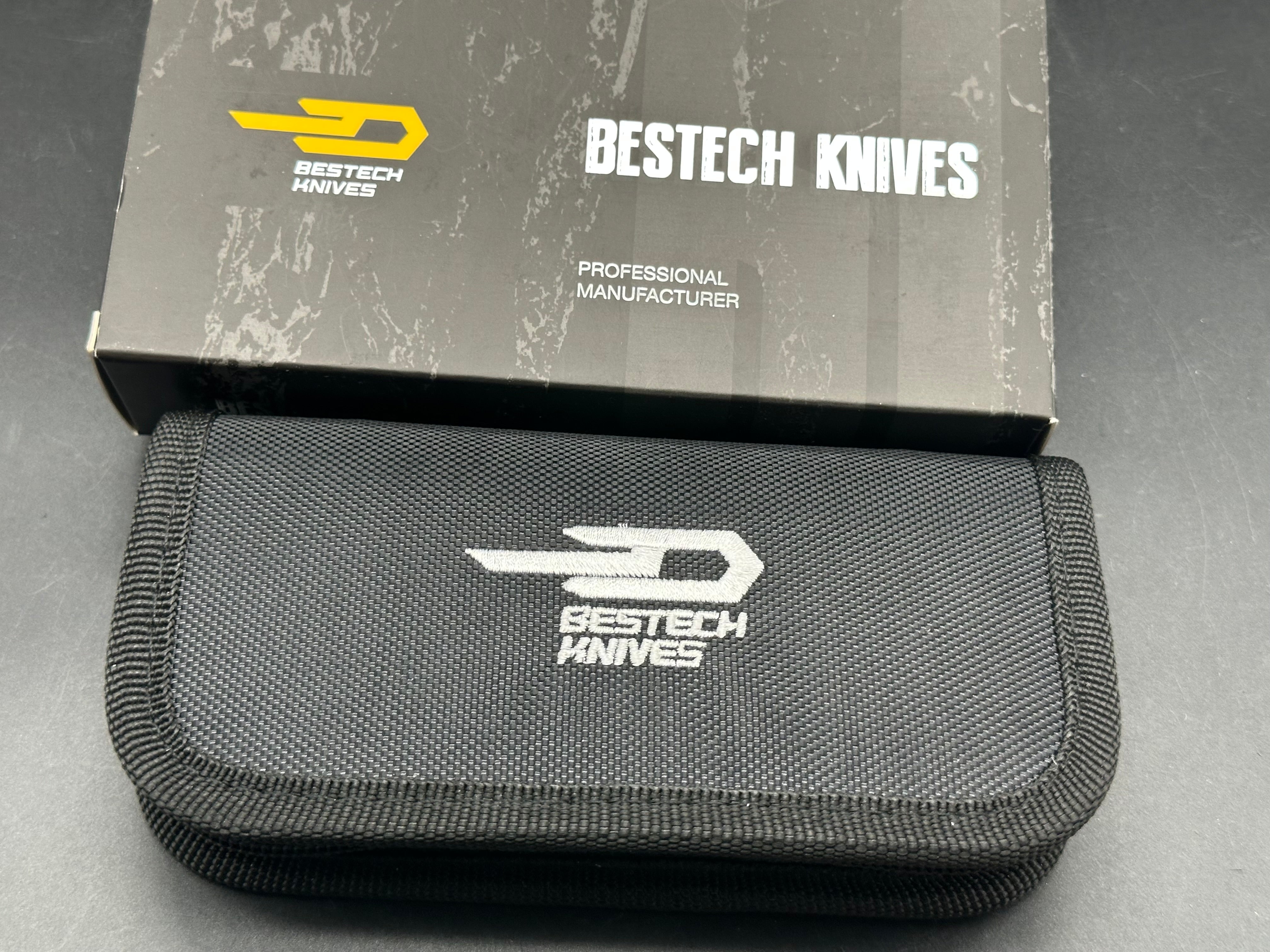 Bestech Eskra (BT1813B), Black Stonewashed M390 Blade, Contoured Blue Anodized Titanium Handles with Micro Milling