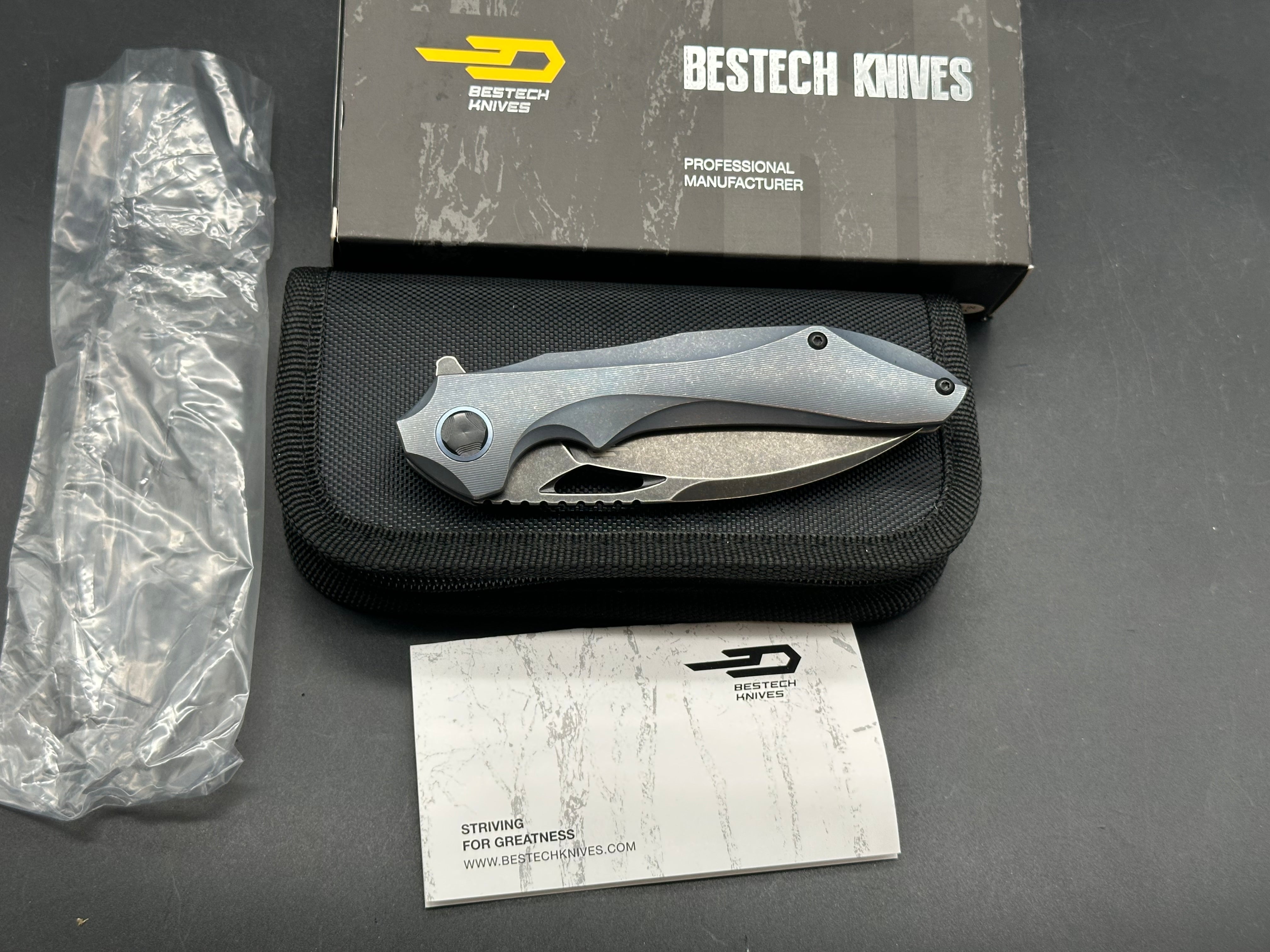 Bestech Eskra (BT1813B), Black Stonewashed M390 Blade, Contoured Blue Anodized Titanium Handles with Micro Milling